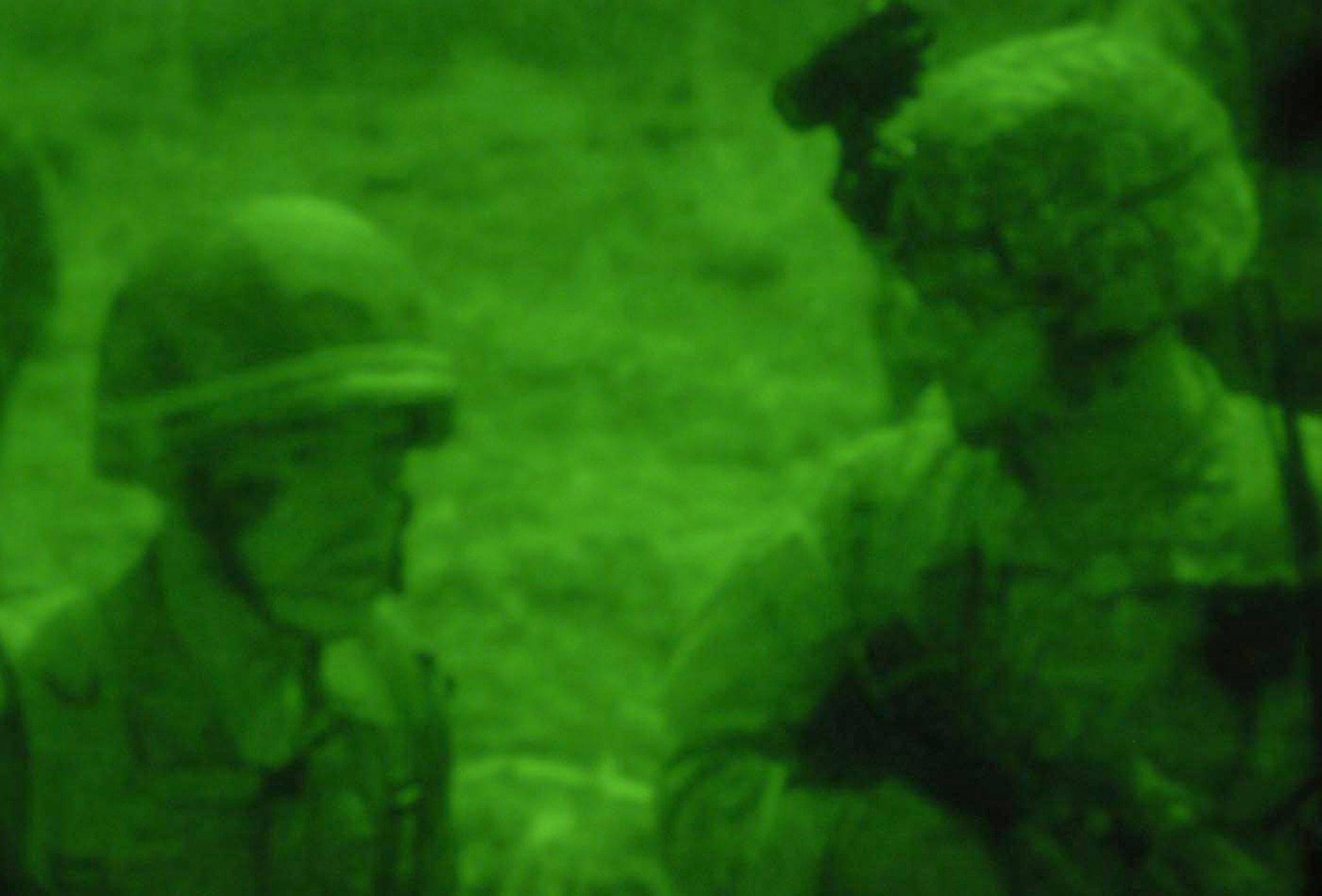 Thai and U.S. officers discuss plans and tactical options under cover of darkness
during a Cobra Gold training mission. (U.S. Army  photo/Staff Sgt. Matthew E. Winstead)