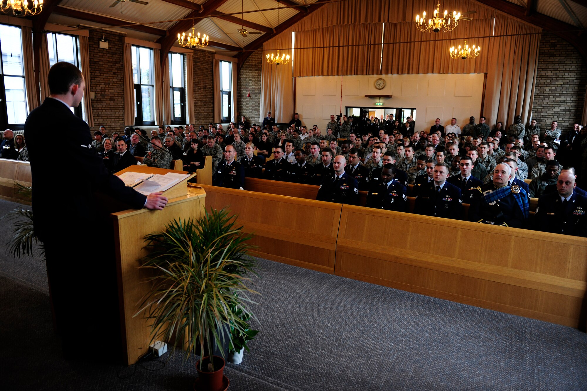 Airman Nicholas Carter, 423rd Security Forces Squadron, spoke about his friend during a memorial service at the RAF Alconbury chapel March 4.  Airman Carter spoke about how close he was to Airman 1st Class Christoffer Johnson, who died Feb. 17 while on final security patrol in Southwest Asia.  (U.S. Air Force photo/Tech. Sgt. John Barton)