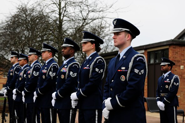 The 423rd Air Base Group Honor Guard rifle team stand at parade rest before the start of a memorial service for Airman 1st Class Christoffer Johnson at the RAF Alconbury Chapel March 4.  Airman Johnson died Feb. 17 while on final security patrol in Southwest Asia.  (U.S. Air Force photo/Tech. Sgt. John Barton)