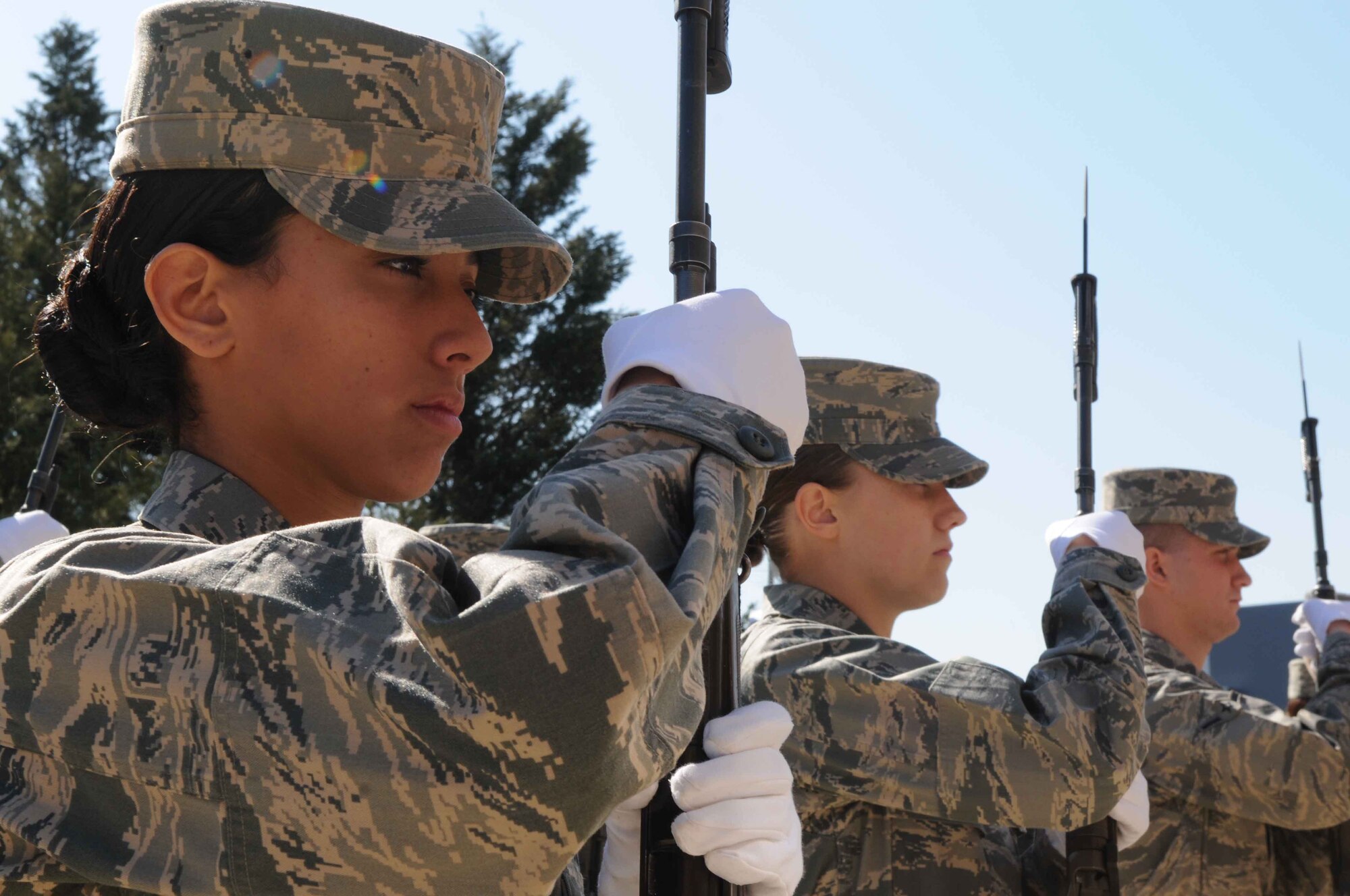 Airman Amber Brown, a trainee in The U.S. Air Force Honor Guard, stands in formation while holding her rifle Mar. 2 at the Honor Guard compound on Joint Base Anacostia-Bolling, Washington, D.C. The eight-week Honor Guard technical training school requires the trainees to master four drills, each taking approximately two weeks to execute. “We were teaching them drill-two movements,” said Senior Airman Leonard Brower, training course supervisor with The U.S. Air Force Honor Guard. Drill-two movements consist of everything from a basic right- and left-face, to right shoulder and left shoulder moves, he said. “Everything they need to know to march at Arlington.” (U.S. Air Force photo by Senior Airman Christopher Ruano)