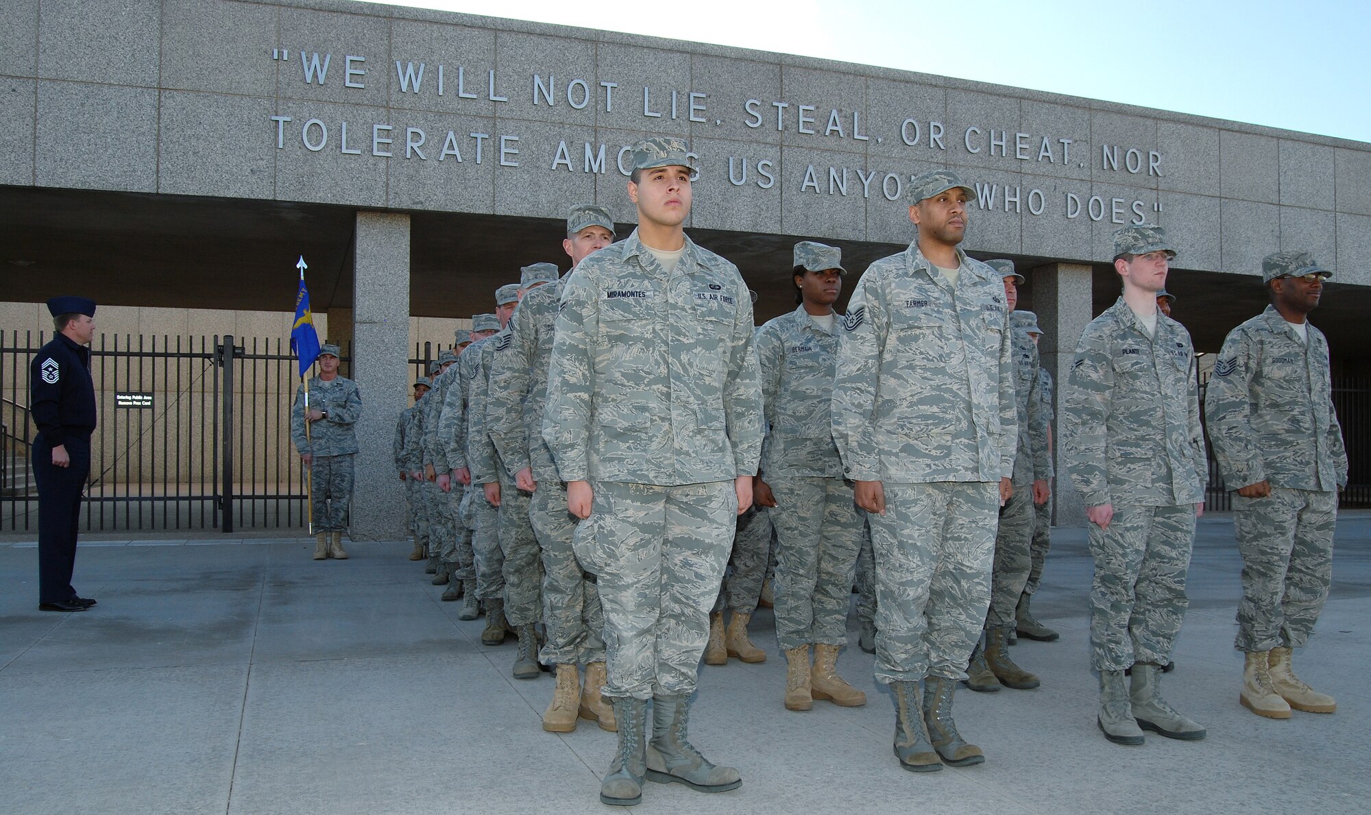 A group of the Air Force Academy's enlisted Airmen prepares to march to the Air Garden to observe retreat in the Terrazzo March 3, 2011. Academy Command Chief Master Sgt. Todd Salzman marched the flight, with Master Sgt. Greg Meinert, the Headquarters Section first sergeant, serving as guidon bearer. (U.S. Air Force photo/Staff Sgt. Don Branum)