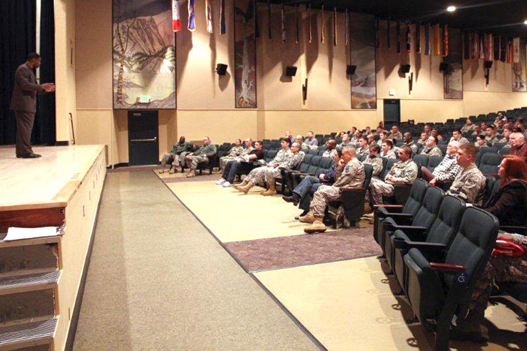 Herschel Walker speaks to JBER Soldiers and Airmen Feb. 22 at the Post Theater. Walker is the spokesman for the Freedom Care Program in 2008, a specialized mental health and addiction treatment program for service members. (U.S. Army photo/Sgt. Tamika Dillard)