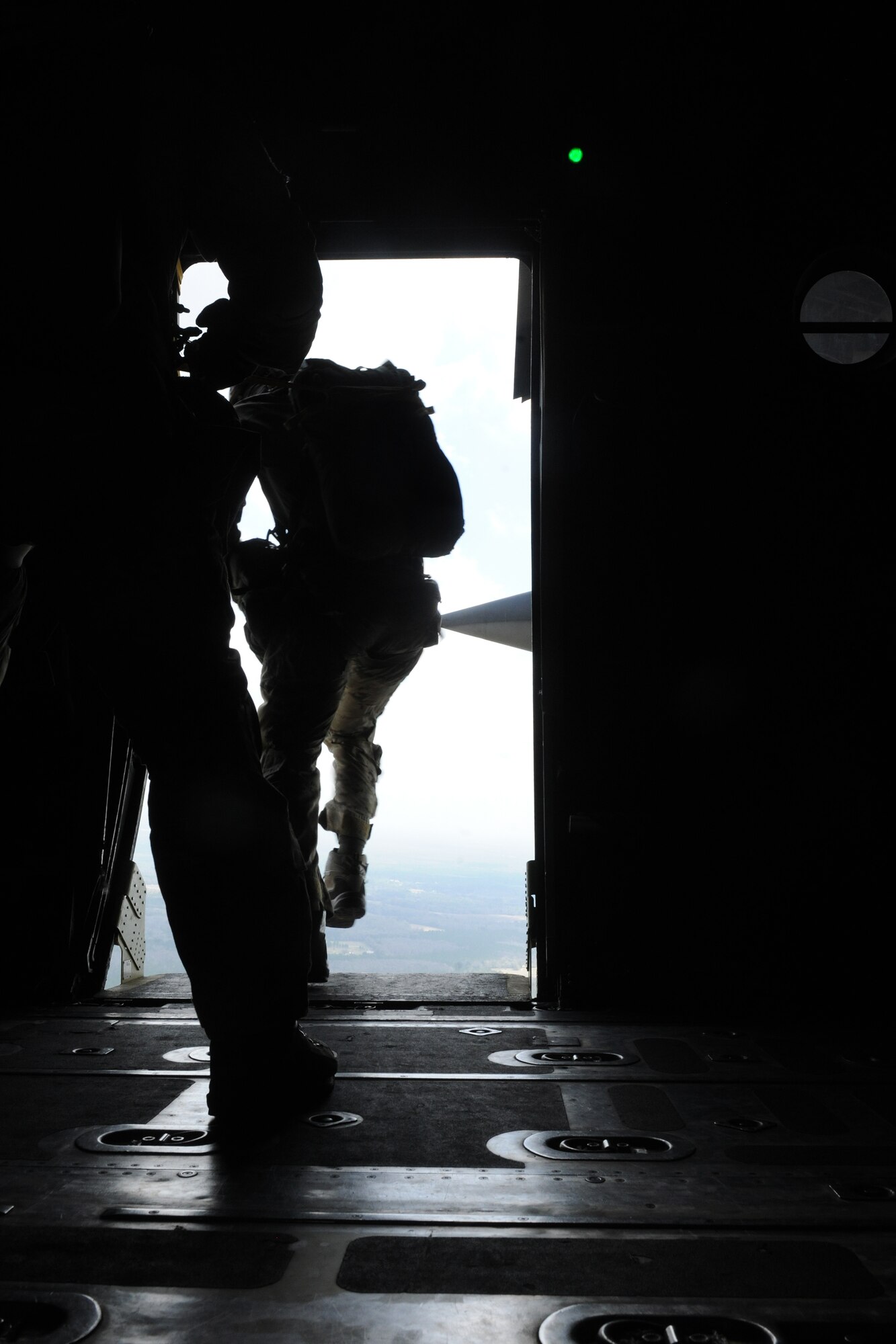 VALDOSTA, Ga.-- A pararescueman from the 38th Rescue Squadron jumps from an HC-130P Combat King aircraft from the 71st Rescue Squadron during training recently. Once the pararescuemen landed from the jump, they provided medical support for two injured personnel as part of the training scenario. (U.S. Air Force photo/Airman 1st Class Benjamin Wiseman)(RELEASED)
