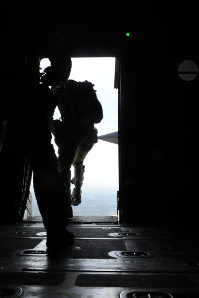 VALDOSTA, Ga.-- A pararescueman from the 38th Rescue Squadron jumps from an HC-130P Combat King aircraft from the 71st Rescue Squadron during training recently. Once the pararescuemen landed from the jump, they provided medical support for two injured personnel as part of the training scenario. (U.S. Air Force photo/Airman 1st Class Benjamin Wiseman)(RELEASED)