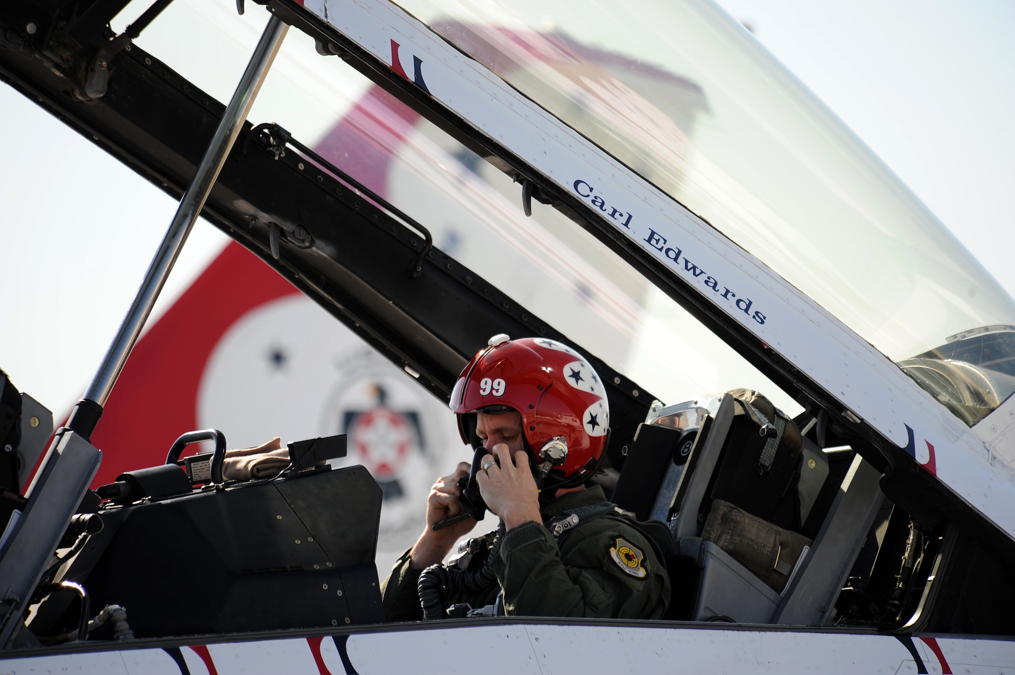 NASCAR driver Carl Edwards prepares himself for his F-16 Fighting Falcon flight with the U.S. Air Force Air Demonstration Squadron "Thunderbirds" at Nellis Air Force Base, Nev., Mar. 3. Edwards, who drives the #99 car, will compete in NASCAR races March 5-6 at the Las Vegas Motor Speedway.
(U.S. Air Force Photo/Staff Sgt. Larry E. Reid Jr., Released)