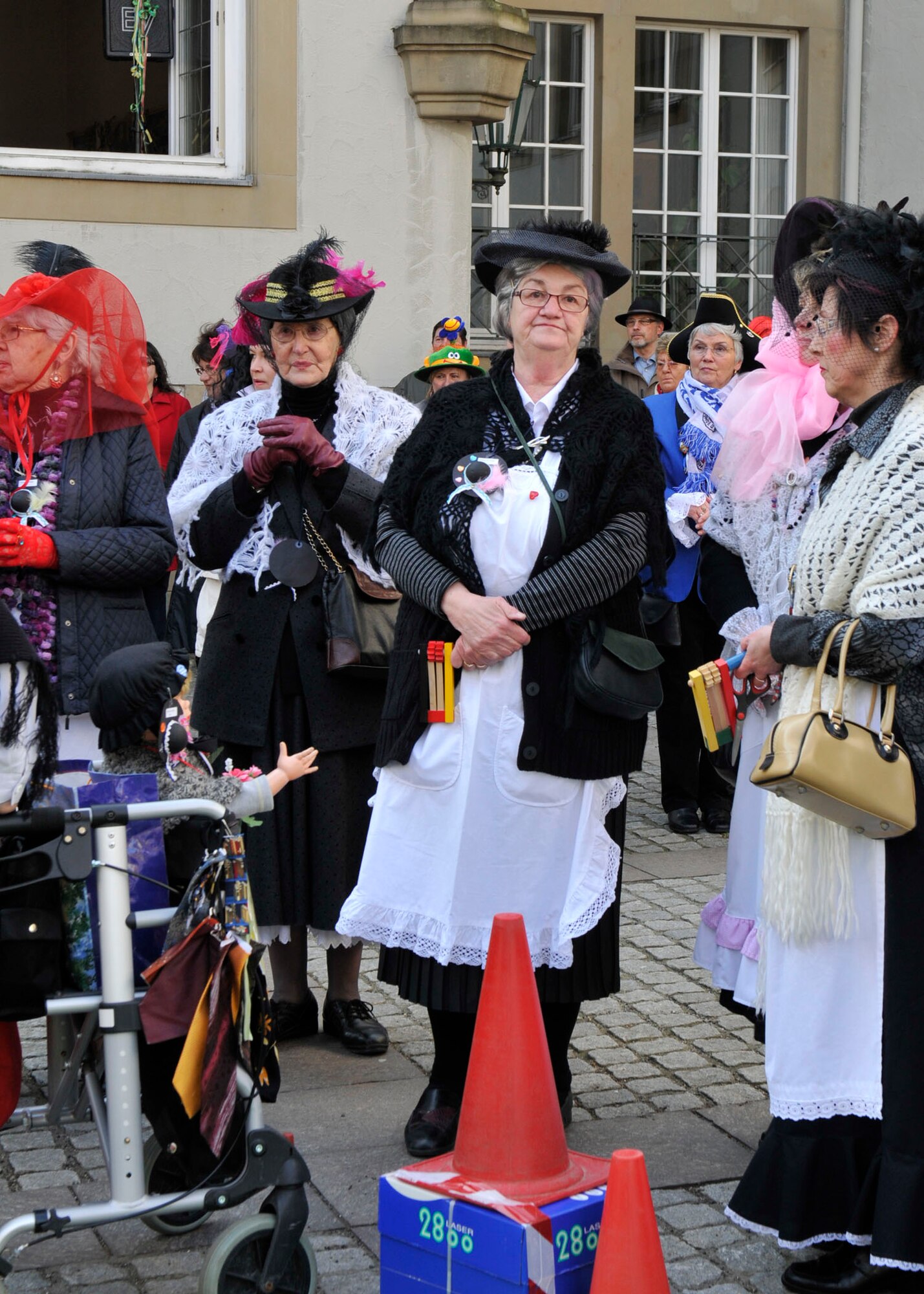 BITBURG, Germany-- Women dress as old ladies and capture the city hall here March 3. After capturing the city hall, the women parade through the city’s streets. In most German cities and towns, including Bitburg, Wittlich and Speicher, it is a tradition for the ladies to “capture” the local city halls and take the city key from the mayor. This occurs at 11:11 a.m. Fat Thursday. (U.S. Air Force photo/Airman 1st Class Brittney Frees)