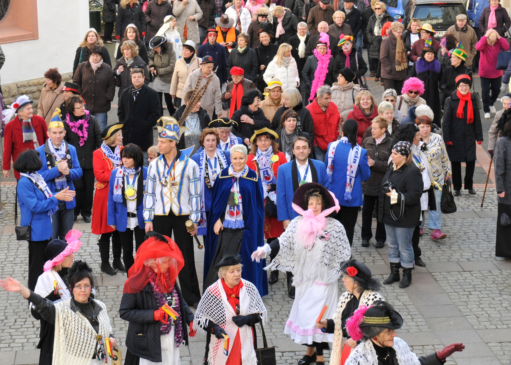 BITBURG, Germany— People dress in colorful costumes to celebrate Fat Thursday for Fasching here March 3. During Fasching, or Fastnacht, often referred to as Germany's silly season, thousands of clubs host costume balls, dances and Kappensitzungen, or joke sessions. The celebration begins on Fat Thursday with Weiberfastnacht, or Ladies Fasching. Fasching is a time to chase away winter spirits and welcome the warmer seasons. (U.S. Air Force photo/Airman 1st Class Brittney Frees)