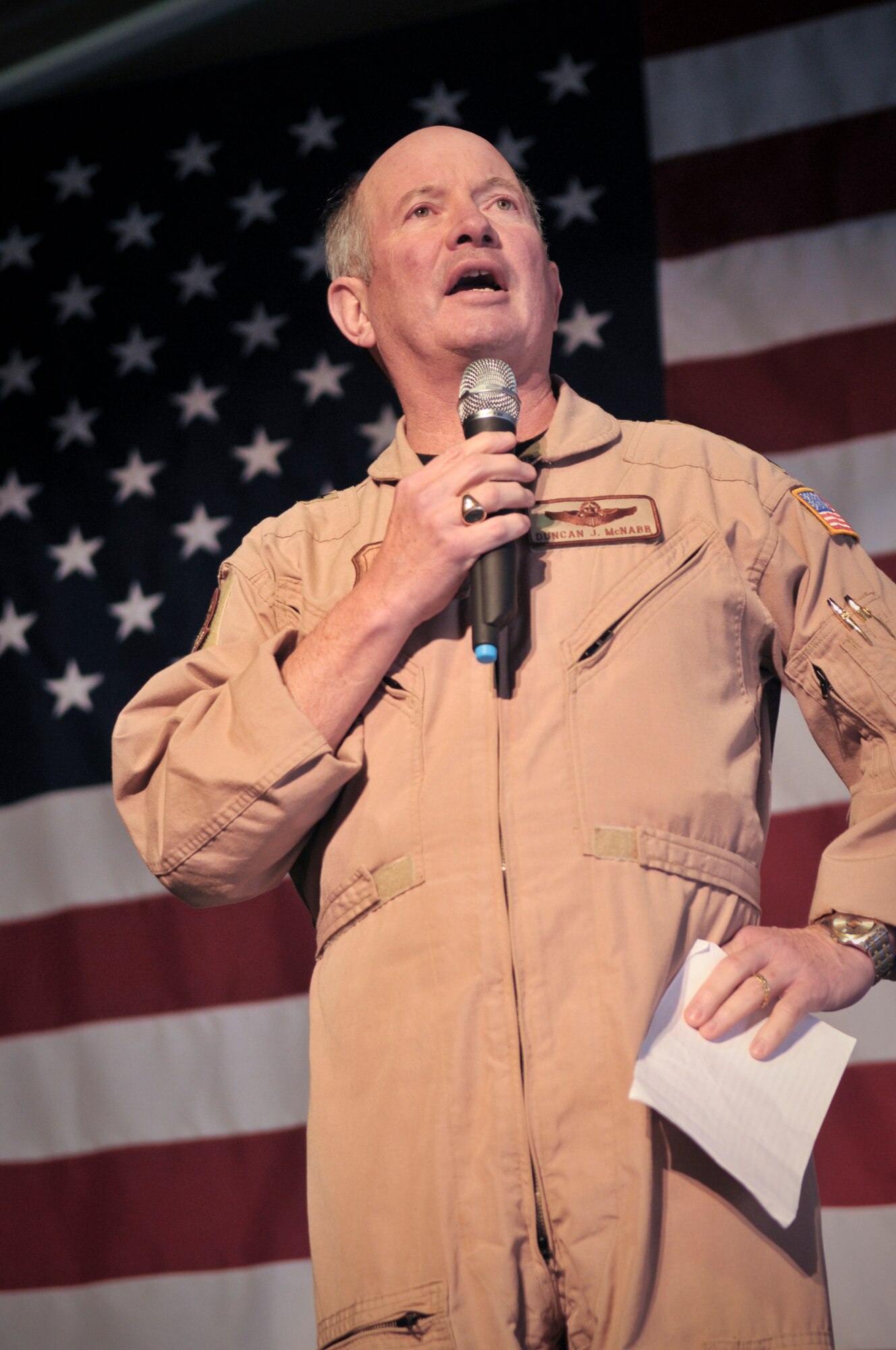 TRANSIT CENTER AT MANAS, Kyrgyzstan - Gen. Duncan McNabb, commander, U.S. Transportation Command, spends time at the Transit Center at Manas, March 3. During his visit, General McNabb reviewed the transit center operations, surveyed the flight line and talked with the troops. The day ended with an "All Hands" at Pete's Place where he thanked the servicemen and women for their sacrifices. (U.S. Air Force photo/Staff Sgt. Stacy Moless)
