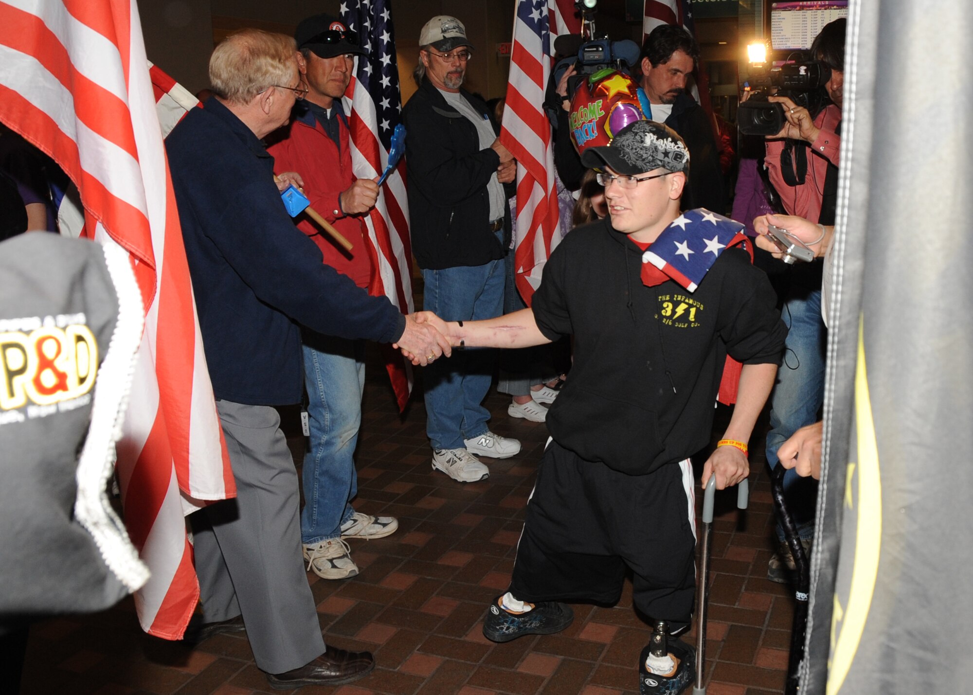 Wounded warrior returns home.
Marine Lance Cpl. Ivan Sears was greeted by more than 400 people at the Albuquerque Sunport when he returned home to New Mexico Feb. 20.

Lance Cpl. Sears lost both legs above the knee last Oct. in an improvised explosive device explosion while on patrol in Afghanistan. 

He has spent the last five months recuperating and rehabilitating at the San Antonio Military Medical Center in Texas. 

Lance Cpl. Sears will return to the San Antonio Military Medical Center at the conclusion of his visit home. 

He will continue his rehabilitation and also be fitted for new prosthetic legs.
