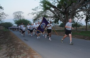 SOTO CANO AIR BASE, Honduras -- Joint Task Force-Bravo commander Col. Gregory Reilly leads the JTF-B run here Mar. 4. The monthly run encourages esprit de corps and physical fitness. Physical Fitness is paramount to mission success. (U.S. Air Force photo/Staff Sgt. Kimberly Rae Moore)