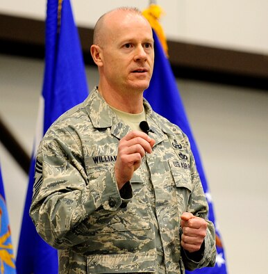 RAF MILDENHALL, England -- Chief Master Sgt. David Williamson, U.S. Air Forces in Europe command chief, speaks to Airmen from Team Mildenhall, here, during an all-call March 2, 2011. The chief stressed how important it is to have every Airman combat ready to include being physically, mentally and spiritually fit. (U.S. Air Force photo/Staff Sgt. Jerry Fleshman)  
