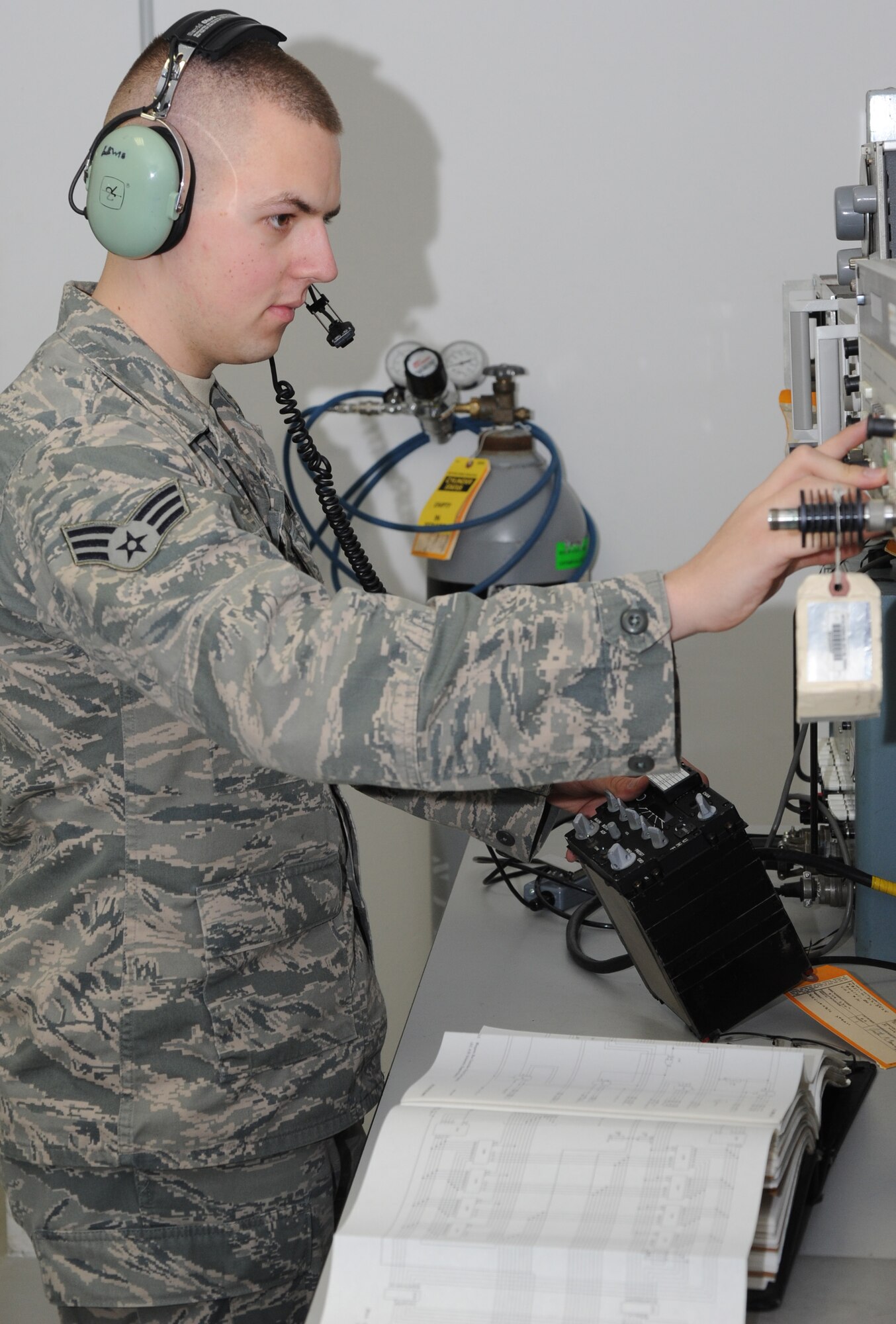 Senior Airman Christopher J. Busch, 31st Aircraft Maintenance Squadron avionics intermediate shop technician, troubleshoots an F-16 ultra high frequency radio transmitter Feb. 28. The 31st Maintenance Group, including the 31st MUNS, received the Air Force Clements McMullen Memorial Daedalian Weapon System Maintenance Trophy. (U.S. Air Force photo by Airman 1st Class LaVel Sterling)