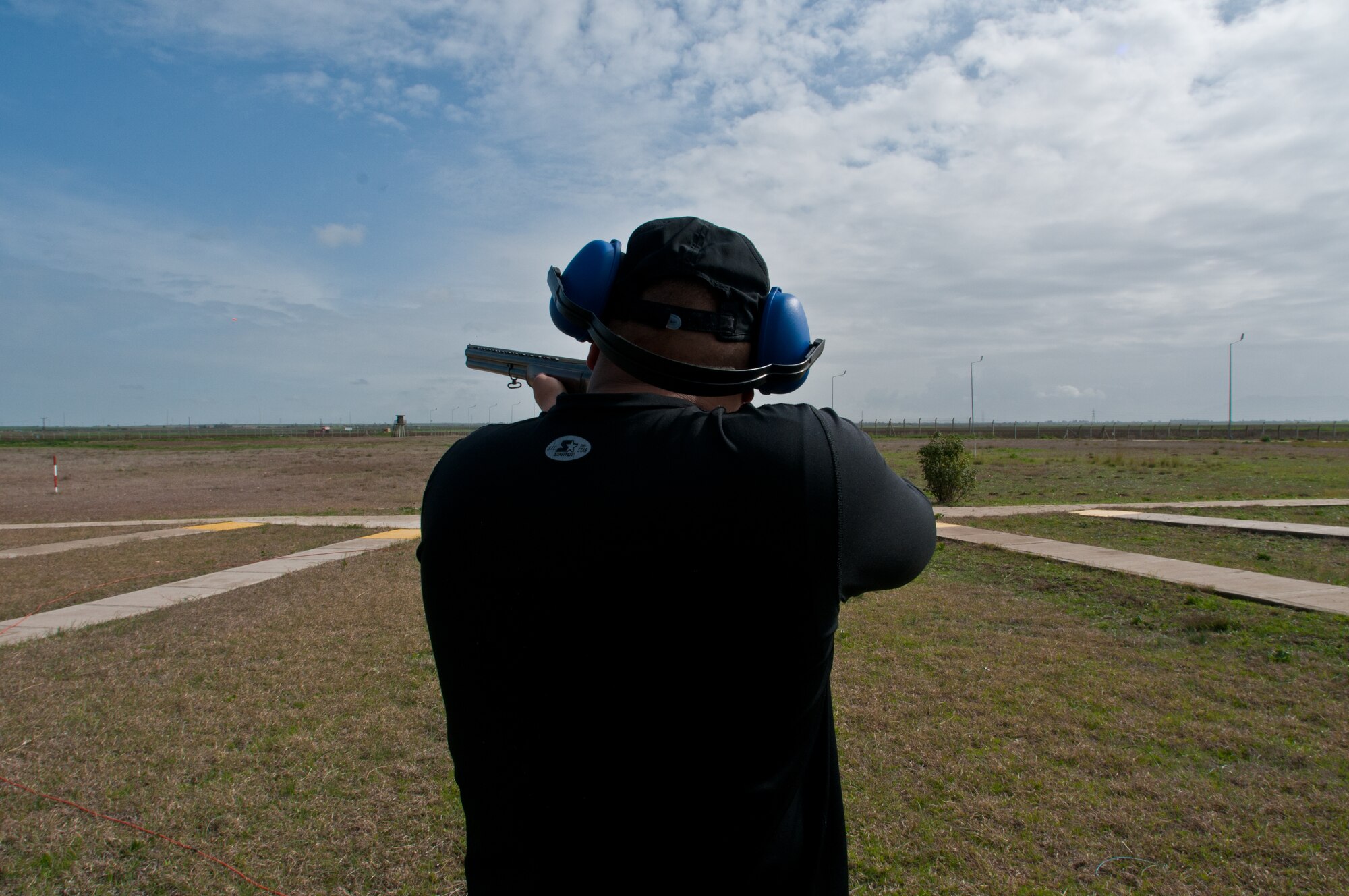 Incirlik Airmen participate in the 10-shot skeet shoot during the 2011 Incirlik Winterthon Feb. 26, 2011, at Incirlik Air Base, Turkey. Each hit reduced the competitor’s time by one minute. The three-part event included a 10 kilometer run, 20 kilometer bike ride and a 10-shot skeet shoot. The 39th Force Support Squadron organized the event to promote active lifestyles and boost morale for Incirlik personnel.    (U.S. Air Force photo by Staff Sgt. Alexandre Montes)
