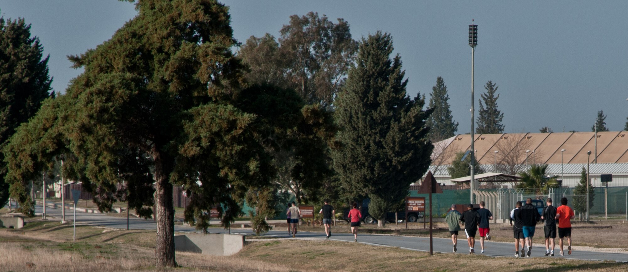 Participating Airmen begin the 10 kilometer run, the first element of the 2011 Incirlik Winterthon,  Feb. 26, 2011, at Incirlik Air Base, Turkey. The three-part event included a 10 kilometer run, 20 kilometer bike ride and a 10-shot skeet shoot. The 39th Force Support Squadron organized the event to promote active lifestyles and boost morale for Incirlik personnel.   (U.S. Air Force photo by Staff Sgt. Alexandre Montes)