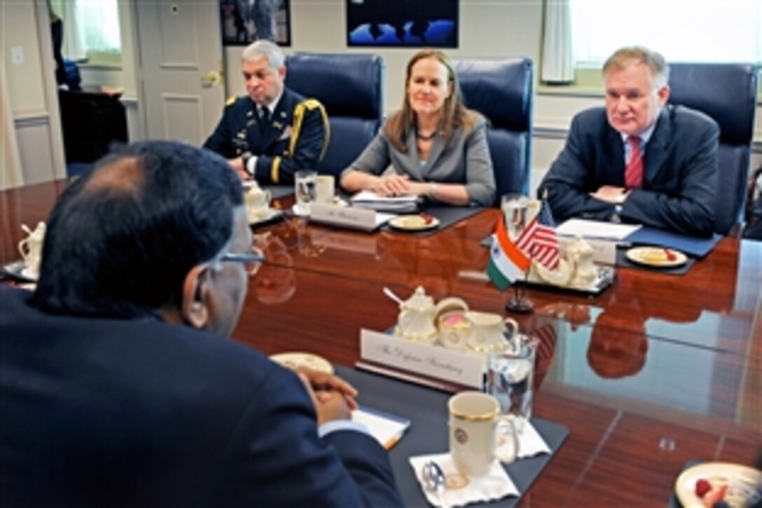 Deputy Secretary of Defense William J. Lynn III, right, meets with Indian Defense Secretary Pradeep Kumar, left foreground, for bilateral security discussions in the Pentagon, March 4, 2011. Also present are Michele Flournoy, undersecretary of defense for policy, and U.S. Army Col. Rick White, U.S. defense attache' to India.