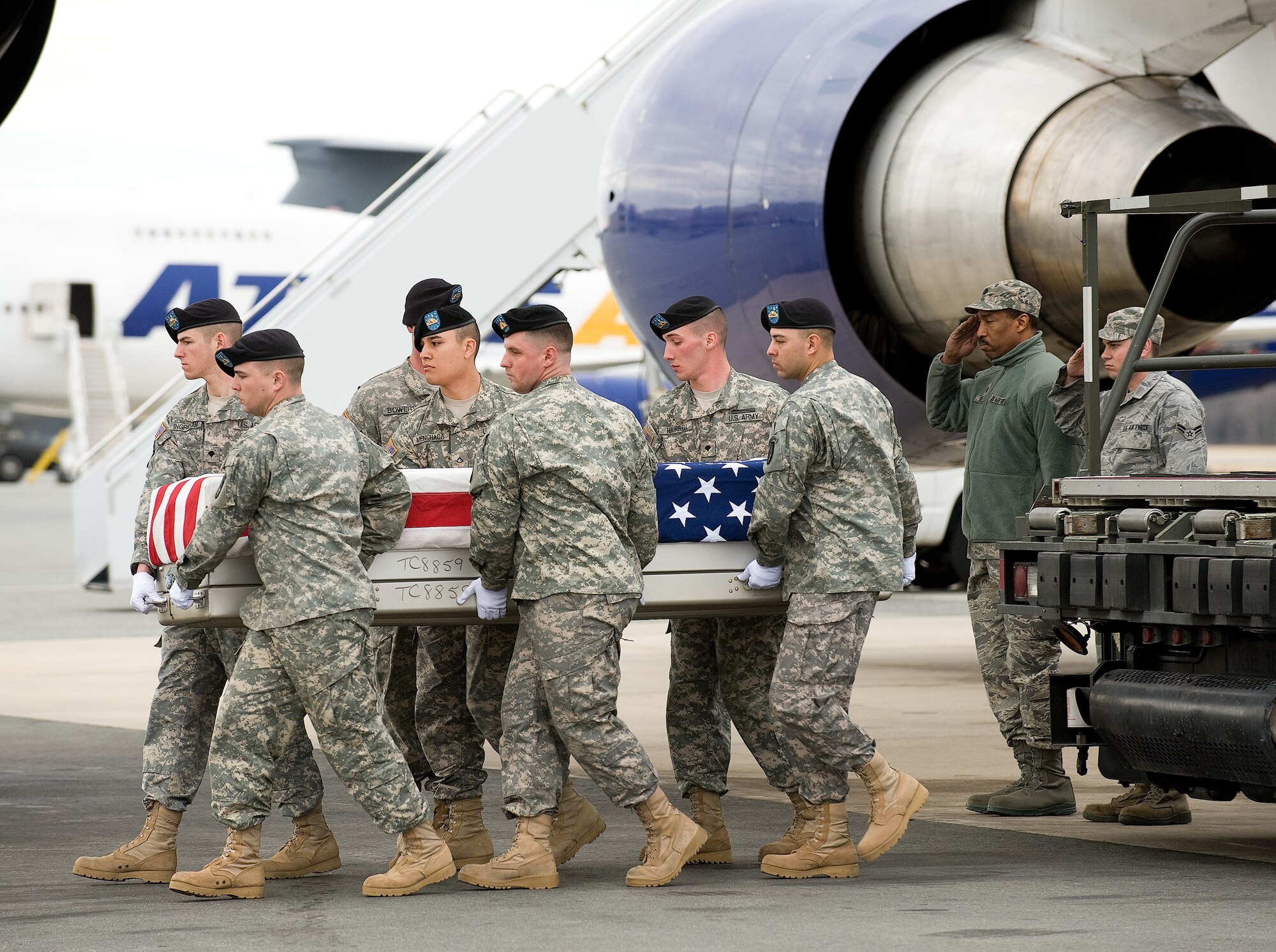 A U.S. Army carry team transfers the remains of Army Spc. Jason M. Weaver of Anaheim, Calif., at Dover Air Force Base, Del., March 5, 2011. He was assigned to the 504th Military Police Battalion, 42nd Military Police Brigade, Joint Base Lewis-McChord, Wash.  (U.S. Air Force photo/Jason Minto)