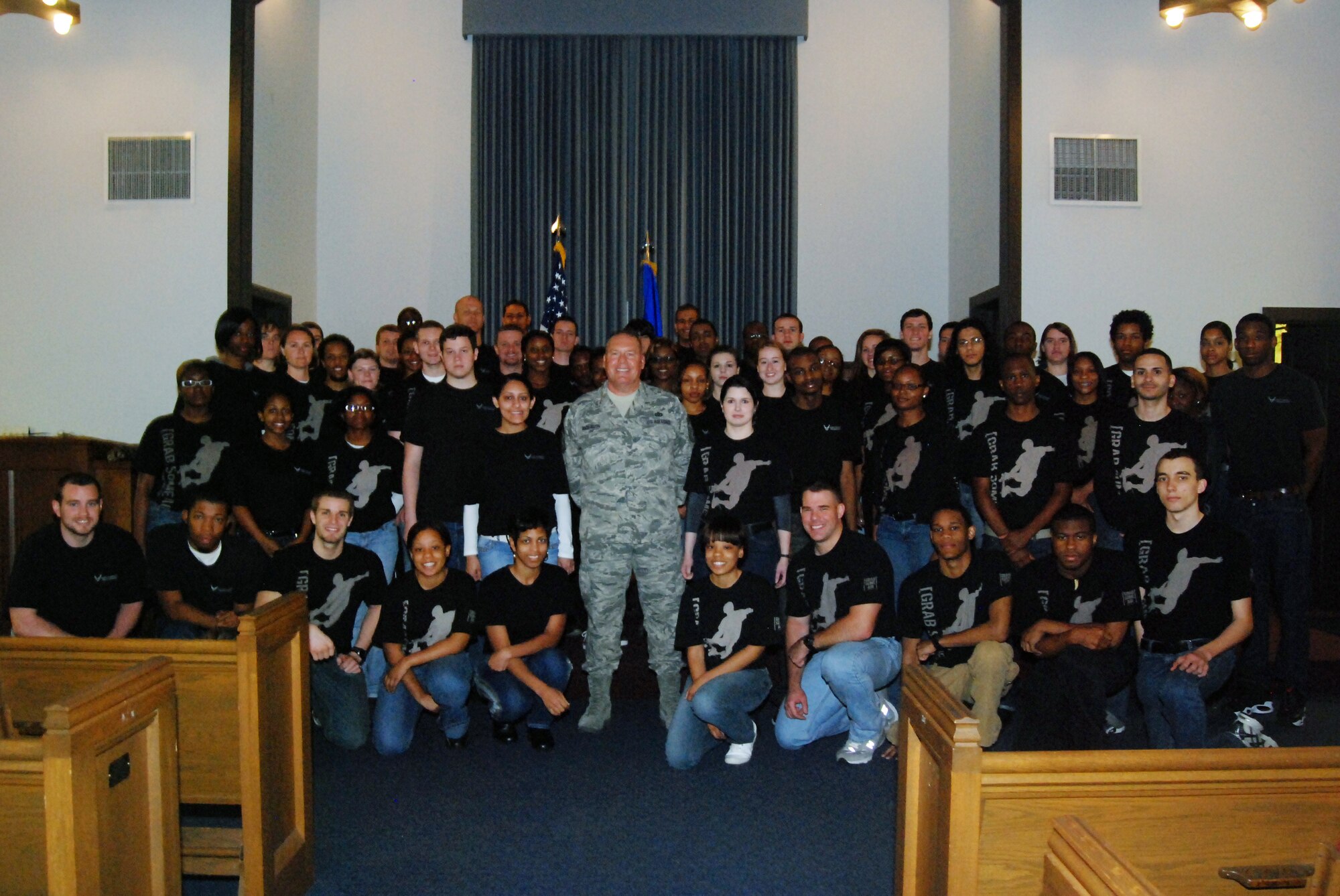 Command Chief Master Sgt. John M. Anderson of the 94th Airlift Wing spoke with the Delayed Entry Program participants at the Dobbins Chapel during the March 5 Unit Training Assembly.  The Air Force Delayed Entry Program is an Air Force initiative where a future Airman may enlist in a Reserve unit of the United States Air Force and specify a future reporting date to attend basic training.  Chief Anderson spent countless hours motivating and sharing with the Airmen of this program over the years; he is scheduled  to retire in April. (U.S. Air Force photo/Senior Airman Danielle Campbell)