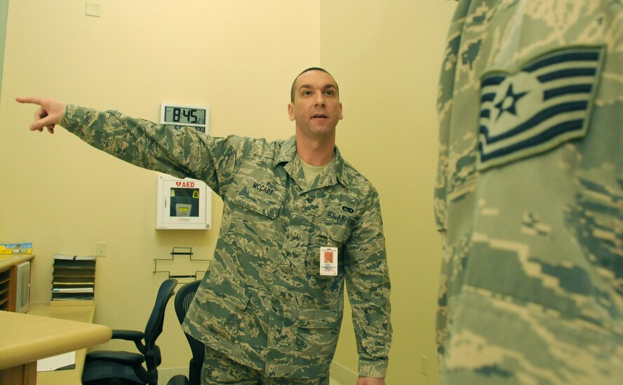 MacDill Air Force Base, Fla. --  Staff Sgt. Joseph McCabe dealt with explosives and munitions before switching career fields to healthcare administration.  His duties include documenting injuries, helping to schedule dental checkups, immunizations, and other appointments.  When not serving his country, the Daytona Beach, Fla. native works as a quality control tester with the Department Of Defense. He put his degrees in science and business administration to work for the 927th Aerospace Medicine Squadron here helping to care for the members of his unit.  He says the best part of his job is working with patients.  For a people person, dealing with people beats dealing with bombs. (Official U.S. Air Force photo by Staff Sgt. Shawn Rhodes)