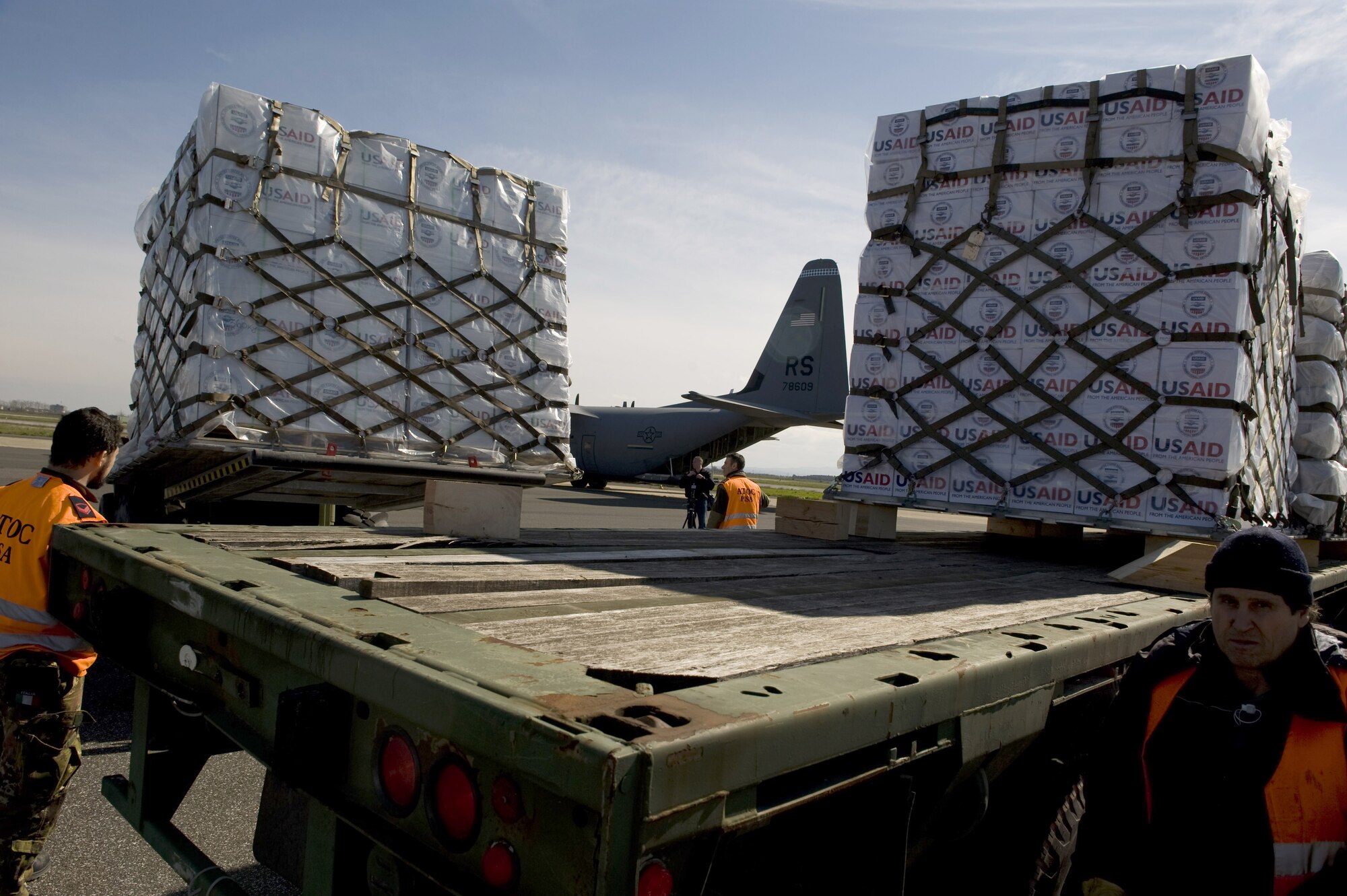 U.S. Airmen from the 435th Air Mobility Squadron, from Ramstein Air Base, picked up blankets, tarps and water containers from the U.S. Agency for International Development to load onto C-130 aircraft in Pisa, Italy. The Air Force will fly the supplies to Tunisia as part of the U.S. government's work with the international community to meet the humanitarian needs of the Lybian people and others in the country who fled across the borders during political unrest. (U.S. Army photo by Staff Sgt. Brendan Stephens)  
