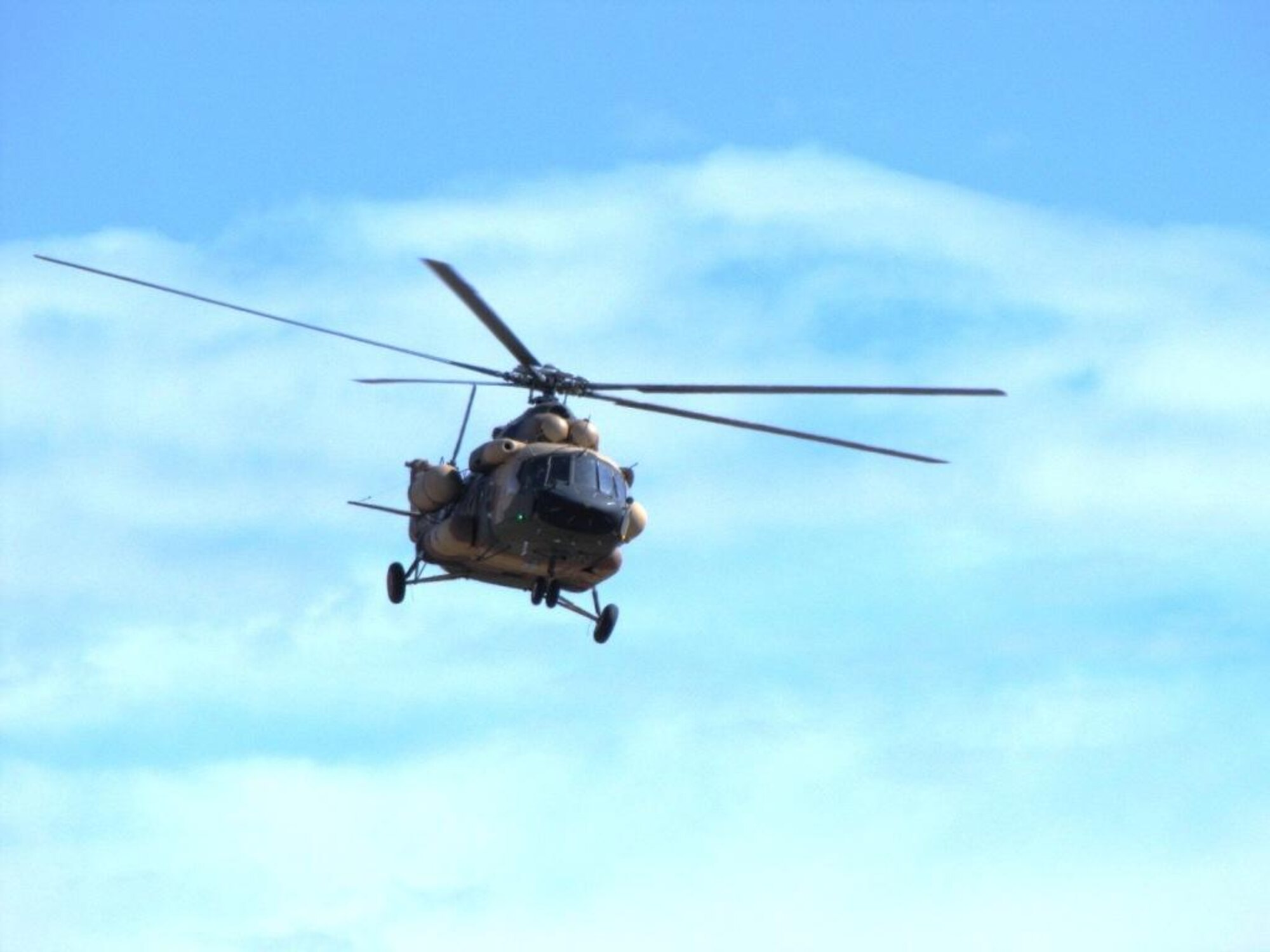 KABUL, Afghanistan - An Afghan Air Force Mi-17 helicopter practices takeoff and landing at a landing strip north of Kabul. (U.S. Air Force photo by Capt. Rob Leese).
