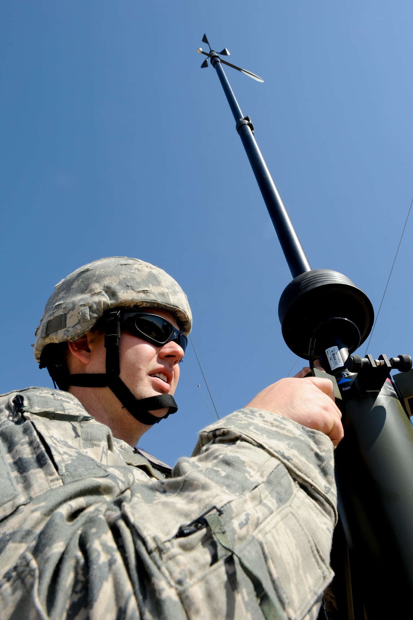 QAYYARAH WEST AIRFIELD, Iraq -- Senior Airman Ryan Unger, 22nd Expeditionary Weather Squadron weather technician, installs a TMQ-53 weather observation system March 2. Airman Unger was part of a three-man weather team that traveled from Baghdad to retrieve U.S. Air Force equipment and install a newly purchased system as part of an ongoing process to set up a self-sustained Iraqi military weather service. Airman Unger is deployed from the 2nd Combat Weather Systems Squadron, Hurlburt Field, Fla., and is a native of Thousand Oaks, Calif. (U.S. Air Force photo by Staff Sgt. Levi Riendeau)