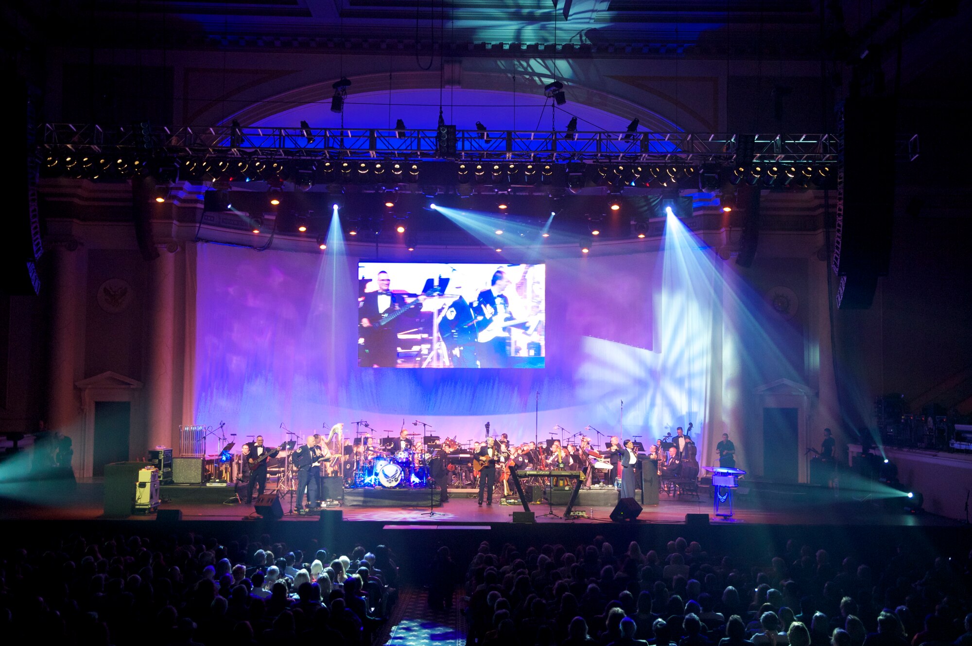 The U.S. Air Force Band plays with country music band Lonestar at Daughters of The American Revolution Constitution Hall, Washington D.C., March 6, 2011. The band also hosted Young Artis Competition winner, Jordan Lulloff of Okemos, Mich. Secretary of the Air Force Michael B. Donley, Chief of Staff of the Air Force Gen. Norton Schwartz, Command Chief Master Sgt. of the Air Force, James A. Roy, and Air Force District of Washington Commander, Maj. Gen. Darren McDew were also in attendance. (U.S. Air Force Photo by Staff Sgt. Raymond Mills.)