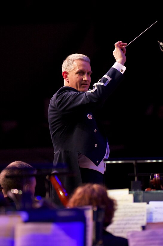 U.S. Air Force Band Commander and Conductor, Lt. Col. A. Phillip Waite, leads the USAF Band orchestra during the final Guest Artist Series concert at Daughters of the American Revolution Constitution Hall, Washington D.C., March 6. The USAF Band hosted country music band "Lonestar" and Young Artist Competition winner, Jordan Lulloff of Okemos, Mich. Secretary of the Air Force Michael B. Donley and Chief of Staff of the Air Force Gen. Norton Schwartz were in attendance.  (U.S. Air Force photo by Staff Sgt. Raymond Mills)