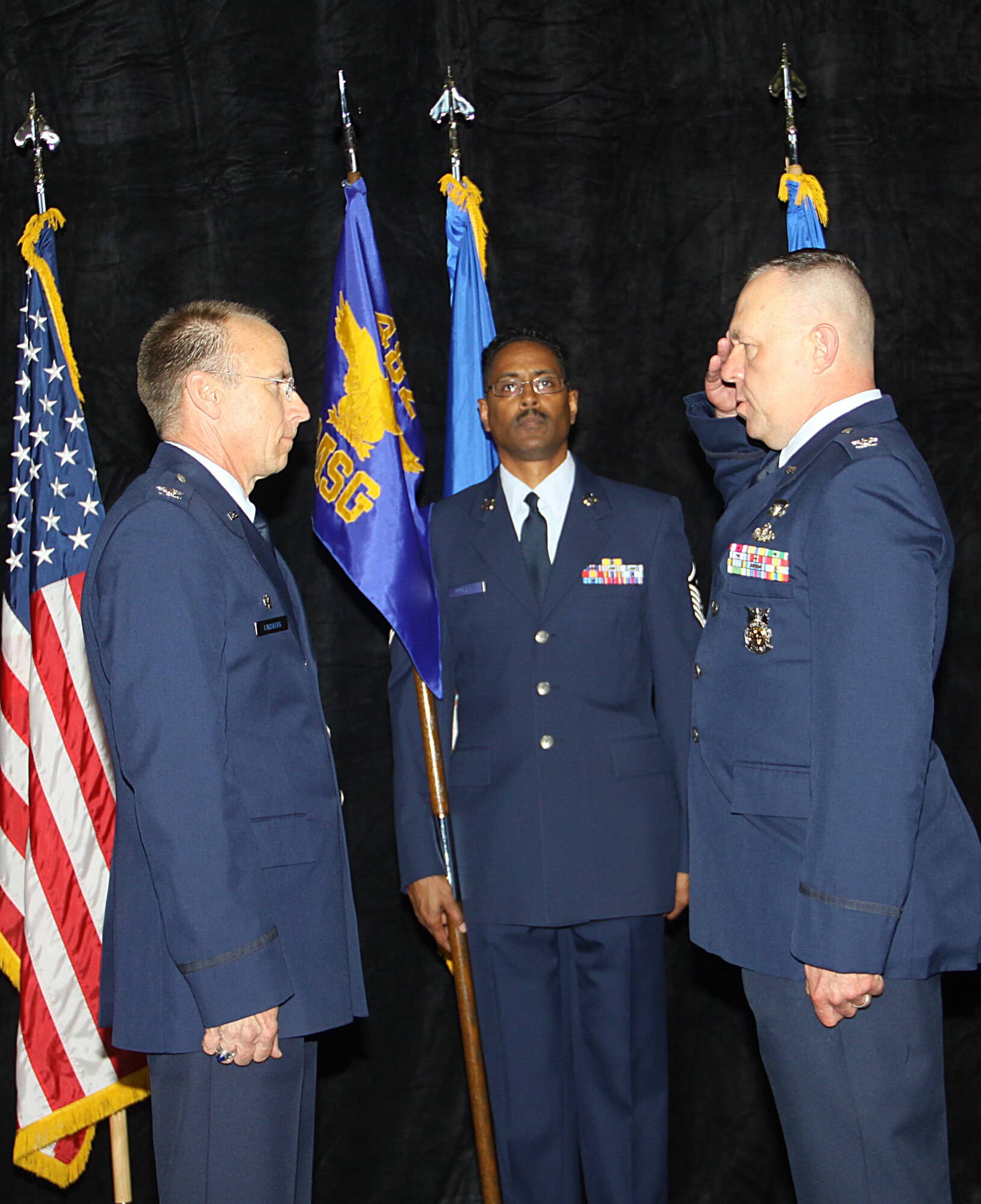 Colonel Elwin A. Rozyskie, Jr. salutes Colonel Donald Lindberg, 482d Commander during the Mission Support Group assumption of command.