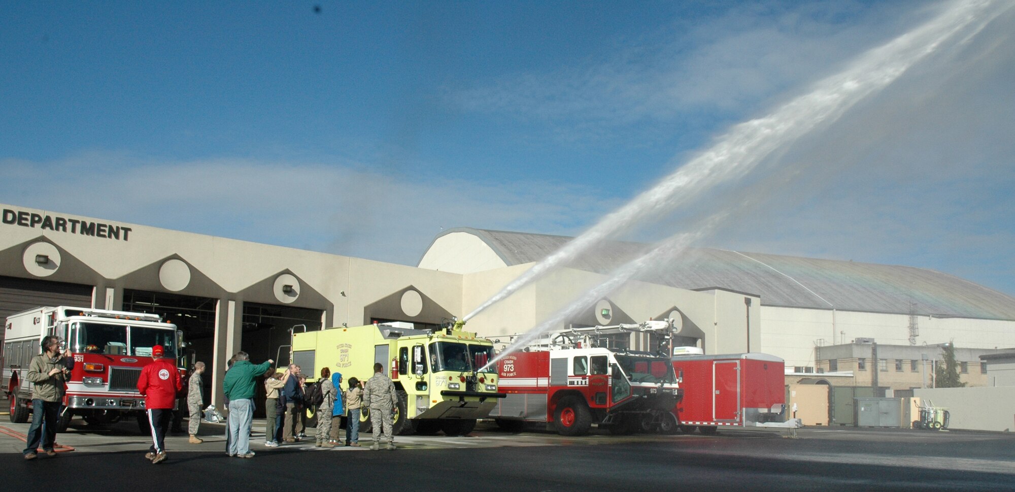 Boy Scouts from Seattle and Redmond, Wash., had a rare chance to fire a water cannon while learning about fire safety during a tour at McChord Field here, March 5, 2011.  During their half-day visit hosted by U.S. Air Force Reservists from the 446th Airlift Wing, the scouts had hands-on fun learning about air traffic control, caring for injured patients, and C-17 Globemaster III missions around the world. (U.S. Air Force photo by Staff Sgt. Elizabeth Moody/Released)