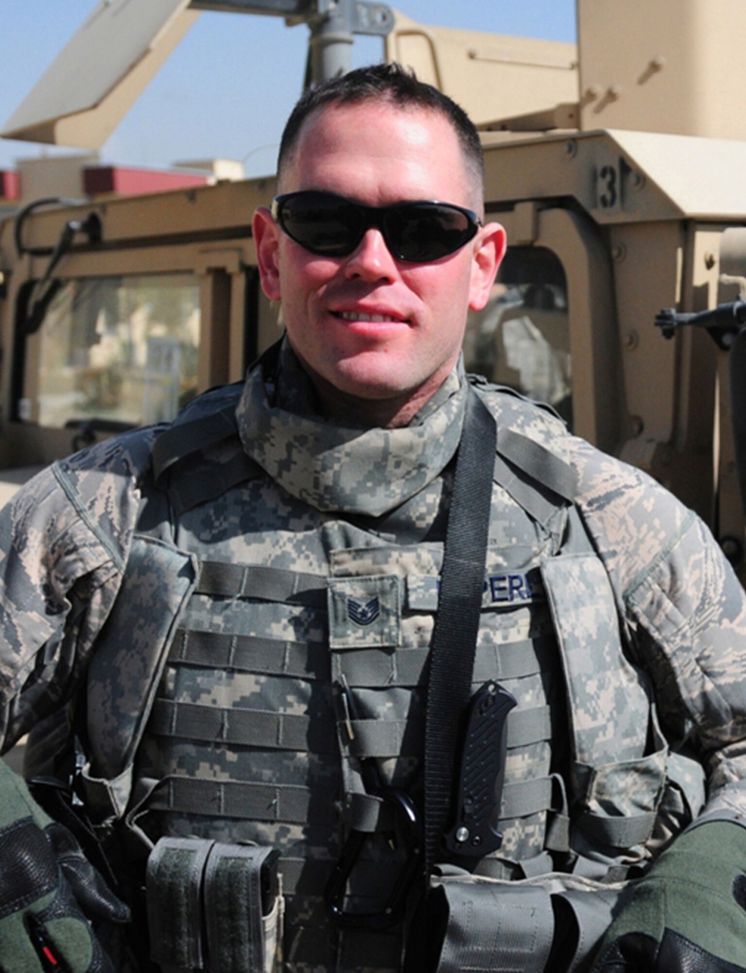 Tech. Sgt. Grady L. Epperly, public affairs specialist with the 507th Air Refueling Wing, poses in front of a Humvee armored vehicle. Epperly was recently awarded the Staff Sgt. Christopher S. Frost Outstanding Communication Noncommissioned Officer Award for being the Air Force’s top public affairs NCO in 2010.