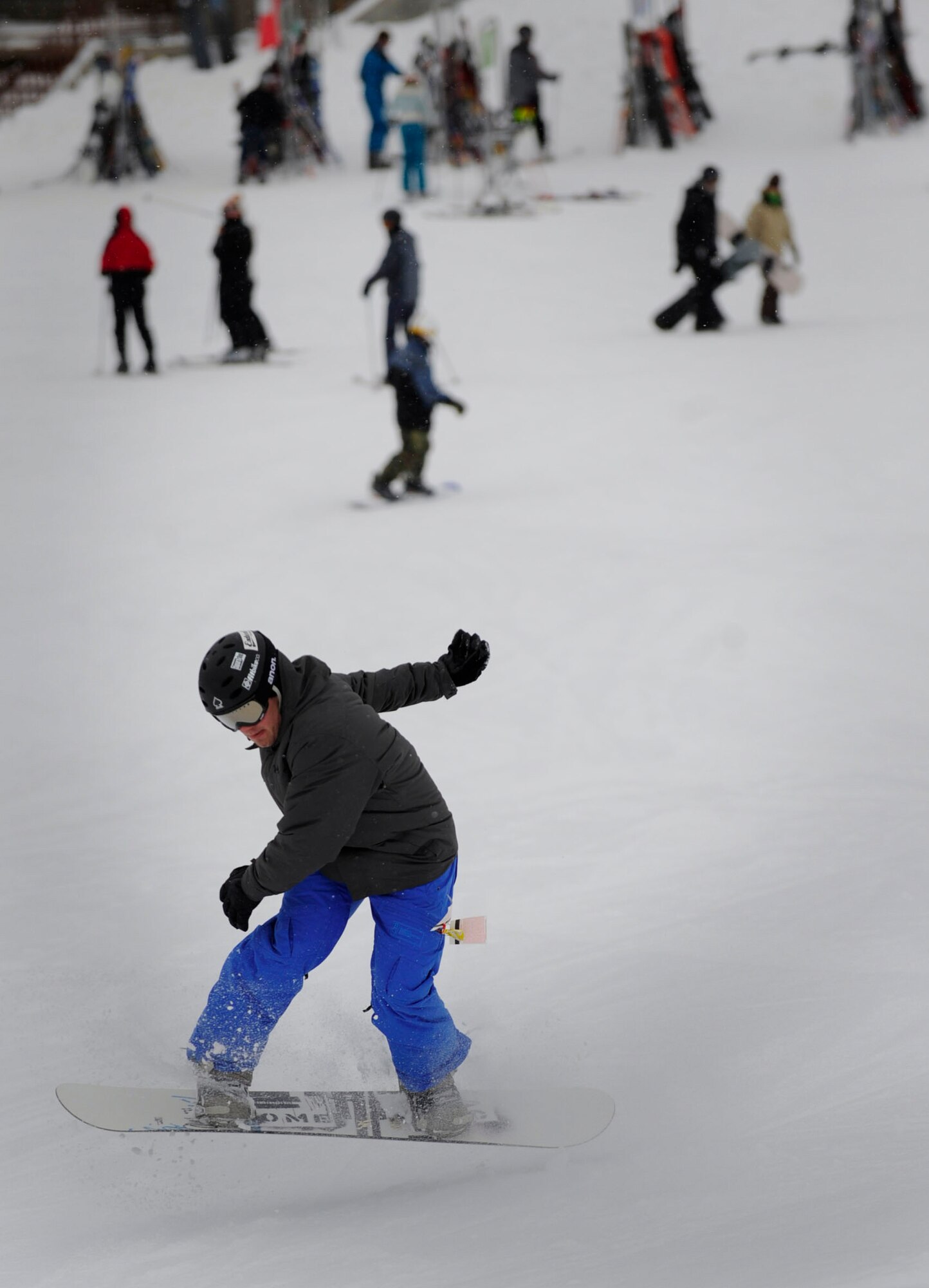 BOISE, Idaho -- Senior Airman Kirk Peiffer, 366th Civil Engineering Squadron firefighter, performs a front side 360 spin at Bogus Basin Recreation Area Feb. 25. The recreation area granted discounted tickets to Airmen and their families for the Gunfighter’s 2011 Winter Sports Day. (U.S. Air Force photo by Airman 1st Class Renishia Richardson)