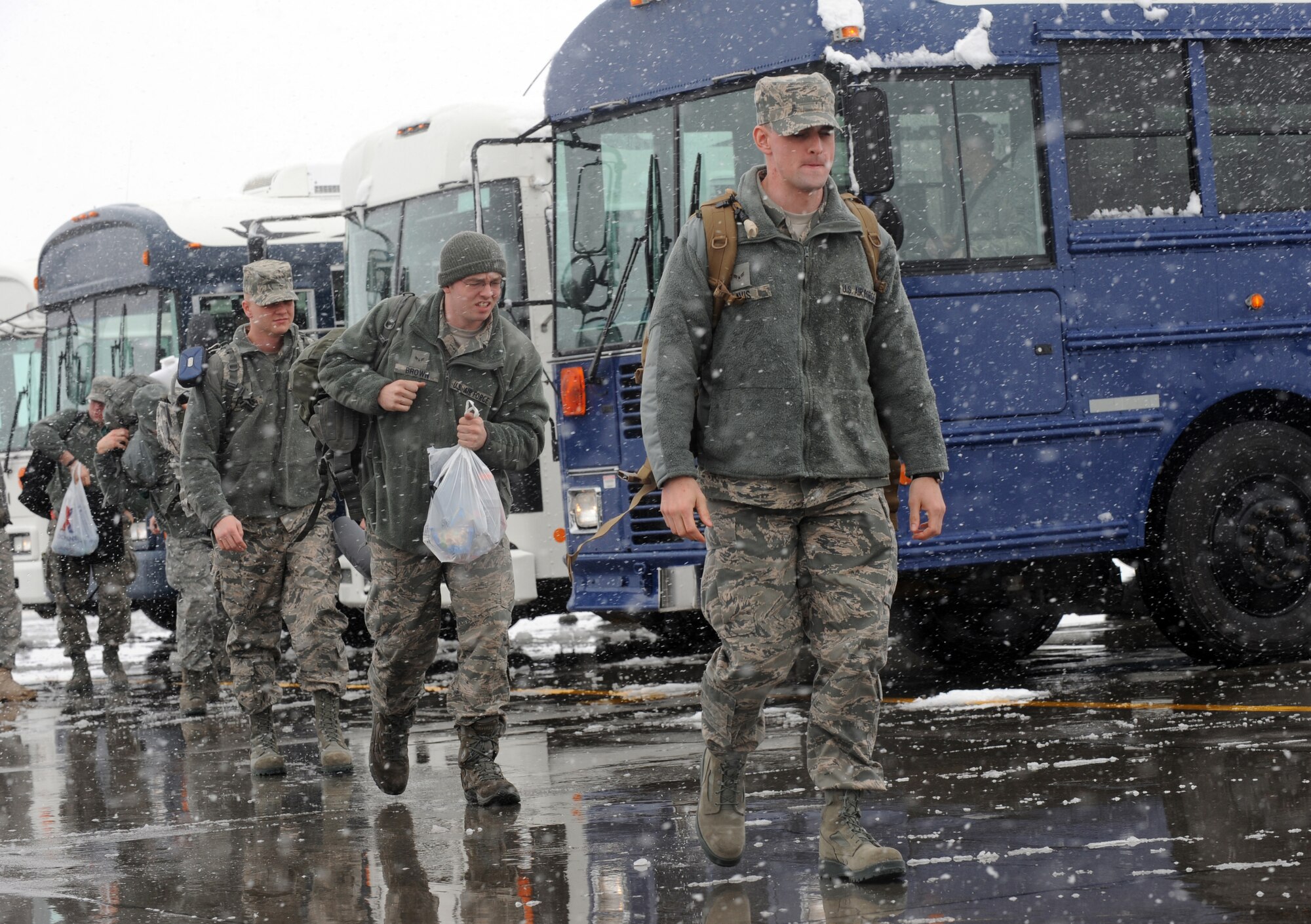 MOUNTAIN HOME AIR FORCE BASE, Idaho - - Airmen from the 389th Aircraft Maintenance Unit walk to an aircraft before their deployment, March 7. More than 400 Airmen from across the 366th Fighter Wing are deploying in support of Operation Enduring Freedom. Airmen in a variety of non-aviation roles are scheduled to conduct a wide range of tasks to ensure the success of providing critical combat power capabilities. (U.S. Air Force photo by Senior Airman Debbie Lockhart)