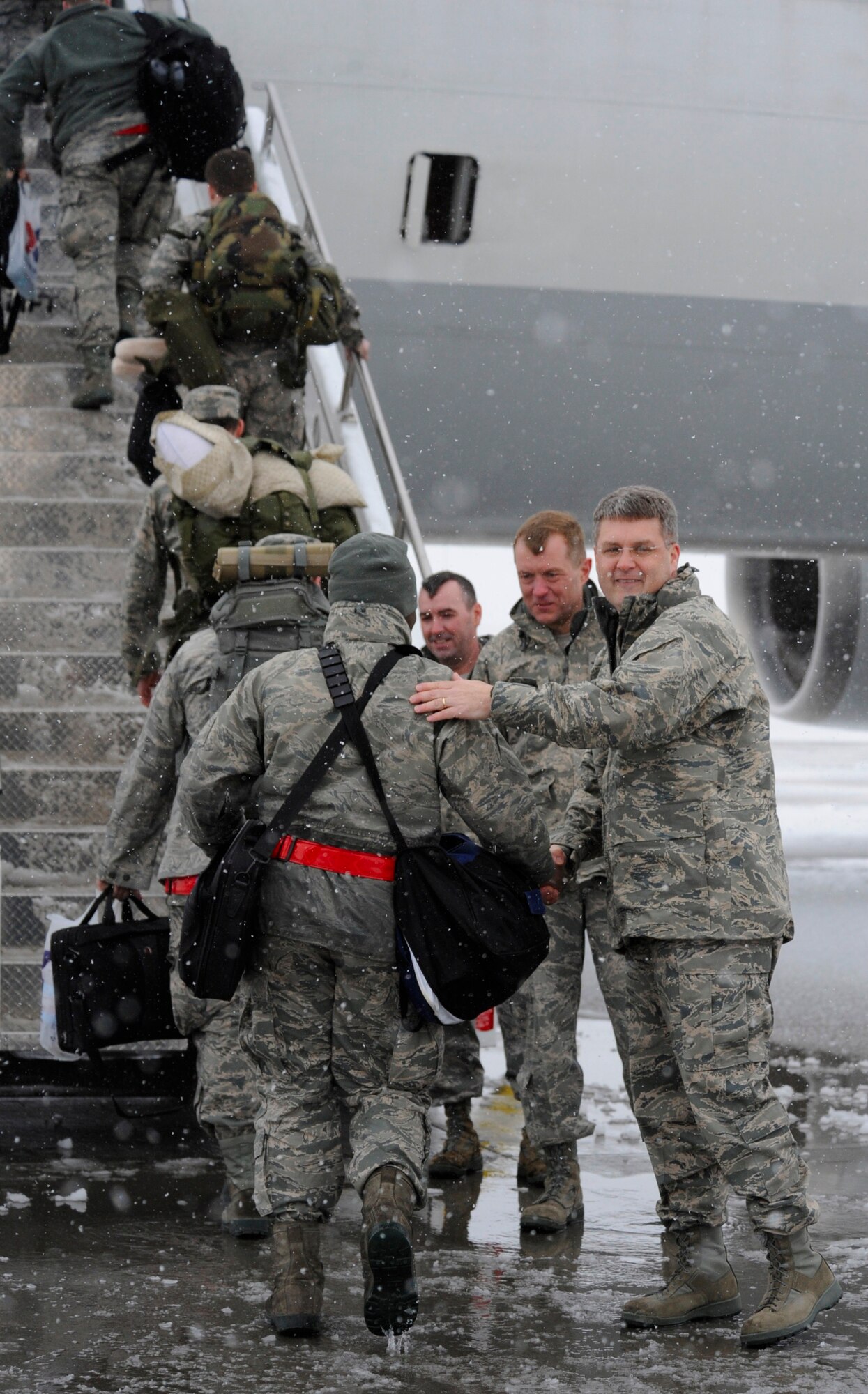 MOUNTAIN HOME AIR FORCE BASE, Idaho -- Col. Ron Buckley, 366th Fighter Wing commander, and wing leadership bid farewell to more than 400 Airmen from across the wing on their deployment to Southwest Asia March 7 in support of Operation Enduring Freedom. Airmen in a variety of non-aviation roles will be conducting a wide range of tasks to ensure the success of providing critical combat power capabilities in that region of the world. (U.S. Air Force photo by Airman 1st Class Renishia Richardson)