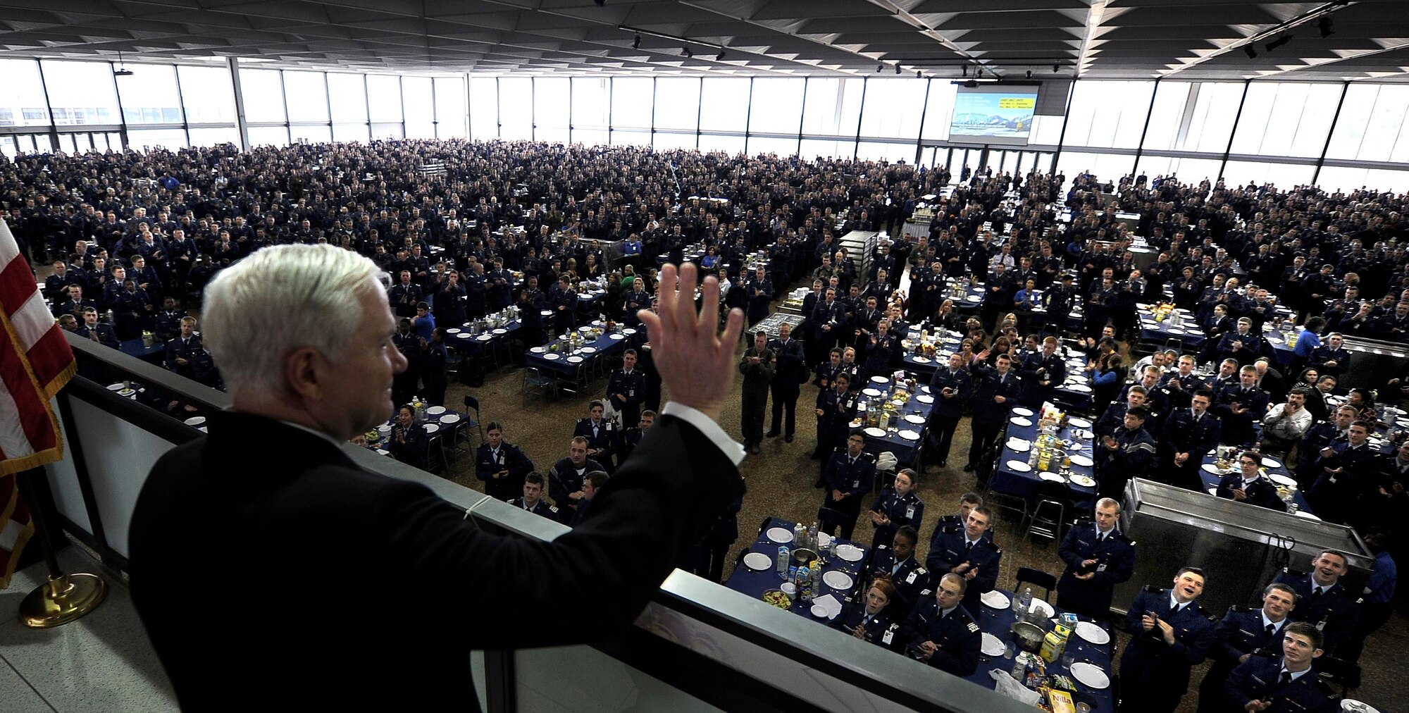 Defense Secretary Robert M. Gates waves to Air Force Academy cadets March 4, 2011, during lunch in Mitchell Hall after teaching classes as part of the Capstone Seminar at the Air Force Academy in Colorado Springs, Colo. (Defense Department photo/Master Sgt. Jerry Morrison)