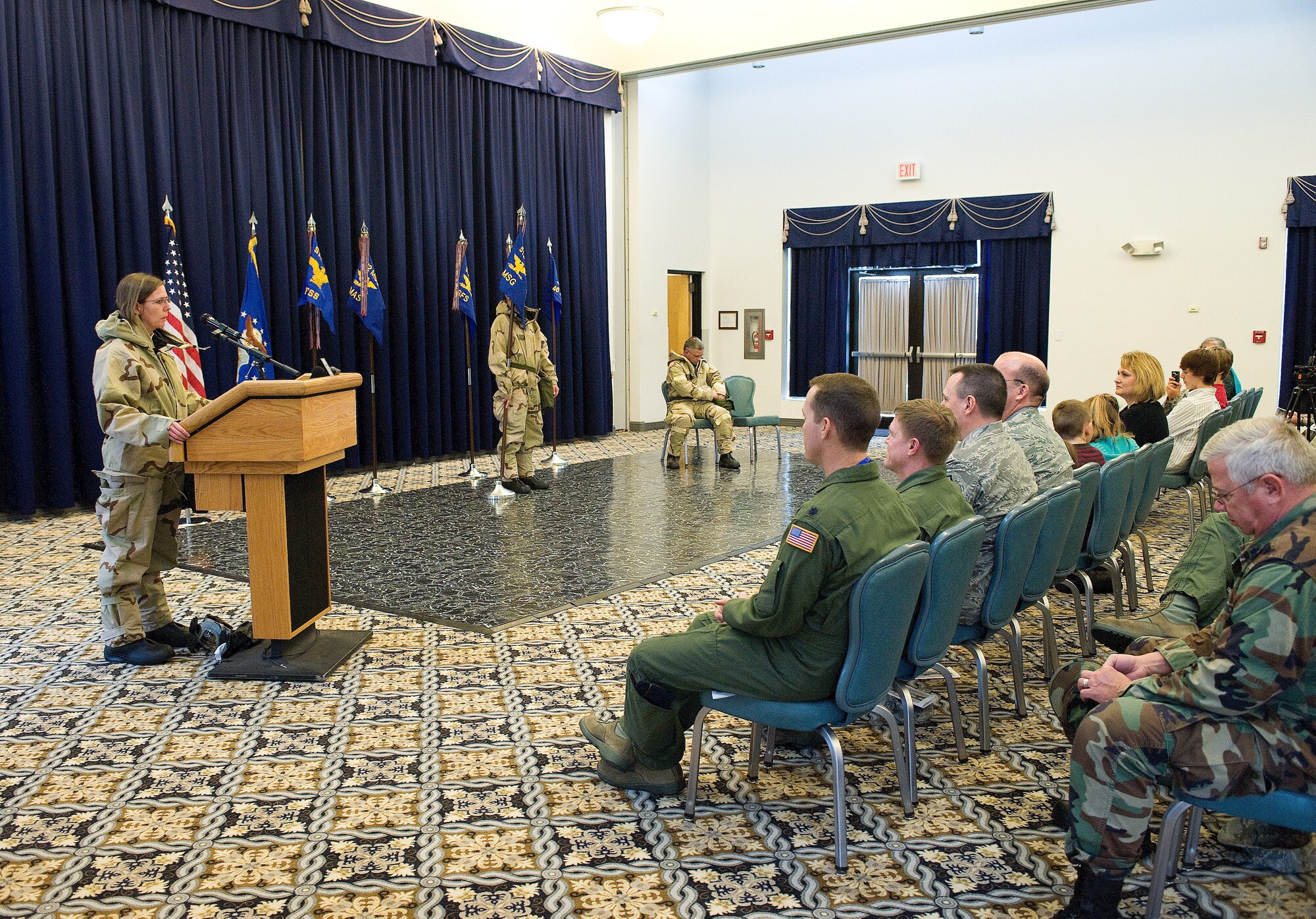 Lt. Col. Gretchen M. Wiltse, 512th Mission Support Group commander, donned Mission Oriented Protective Posture gear at the Landings March 6 as part of her assumption of command.  The demonstration was a way for Colonel Wiltse to set the stage for the wing's preparation for the Operational Readiness Inspection at the end of the year. (U.S. Air Force photo/Jason Minto)