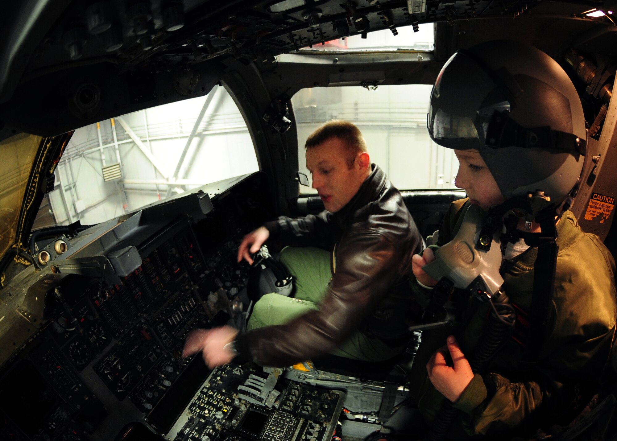 Eight-year-old Noah Misselt from Box Elder, S.D., takes a tour of a B-1B Lancer with Capt. Christopher Stallard, 34th Bomb Squadron pilot, during the Aircrew for a Day program at Ellsworth Air Force Base, S.D., March 4, 2011.  Noah is the third youth to participate in the program since it was revised in June 2010. (U.S. Air Force photo/Senior Airman Anthony Sanchelli)  
