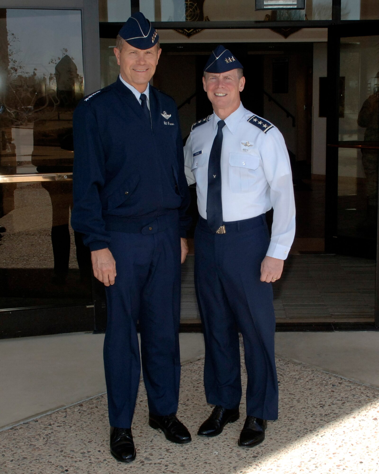 DAVIS-MONTHAN AFB, Ariz. -- Gen. William M. Fraser (left), Air Combat Command commander, stands for a photo with Lt. Gen. Glenn Spears, 12th Air Force (Air Forces Southern) commander during a Mar. 7 visit here. (U.S. Air Force photo/Tech. Sgt. Eric Petosky) 