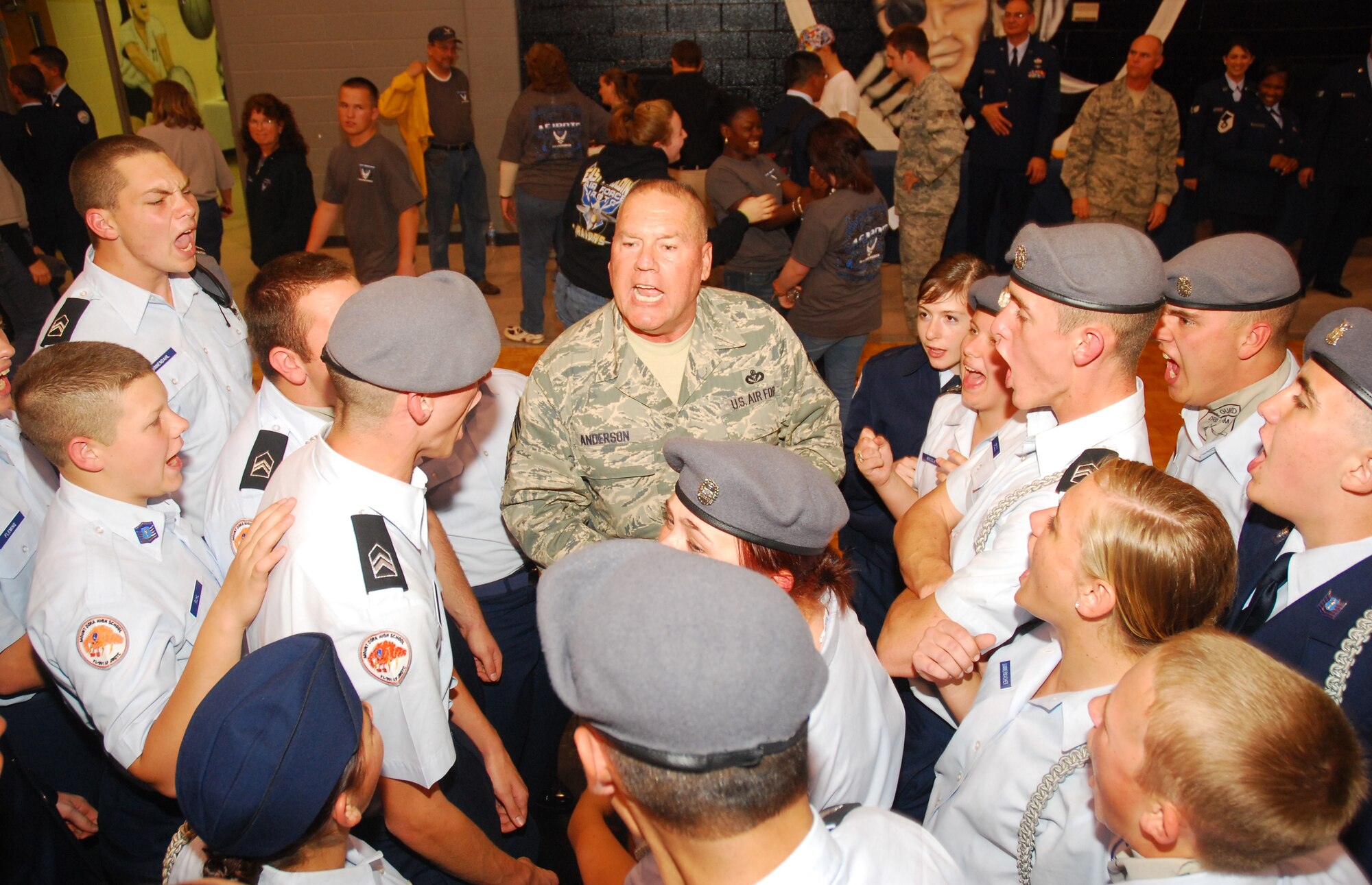 Command Chief Master Sgt. John Anderson, 94th Airlift Wing command chief, rallies Junior Reserve Officer Training Corps students at East Paulding High School during their drill competition March 5. These students came from 15 different high schools and participated in a full day of military drill competition in hopes of taking several trophies back to their respective school.  (U.S. Air Force photo/Shaun Shenk)