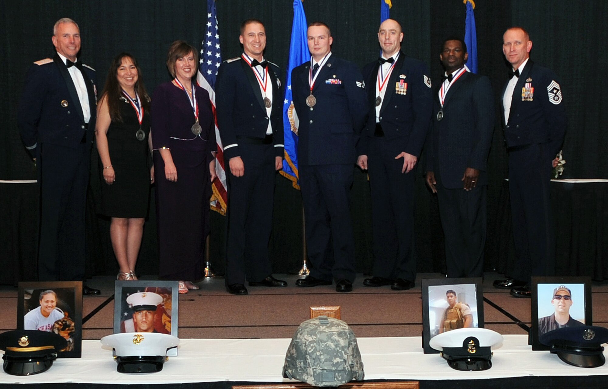 SHREVEPORT, La. - Maj. Gen. Floyd Carpenter (left), Eighth Air Force commander, and Chief Master Sgt. Brian Hornback (right), Eighth Air Force command chief, stand with the Eighth Air Force Outstanding Airmen of the Year: (left to right) Rebecca Smith, 509th Bomb Wing, Whiteman AFB, Mo.; Kelli Kish, representing her husband Master Sgt. Steven Kish, 509th BW; Capt. Michael Pontius, 2nd Bomb wing, Barksdale AFB, La.; Senior Airman Marthinus Taljaard, 2nd BW; Tech. Sgt. Bradley Williams, 5th Bomb Wing, Minot AFB, N.D.; and John Garrett, Headquarters Eighth Air Force, Barksdale AFB. The Eighth Air Force announced their Outstanding Airmen of the Year for 2010 during the Eighth Air Force Outstanding Airmen of the Year Banquet held at the Eldorado Resort and Casino in Shreveport, La., March 3. (U.S. Air Force Photo/Senior Airman La'Shanette V. Garrett)(RELEASED)

