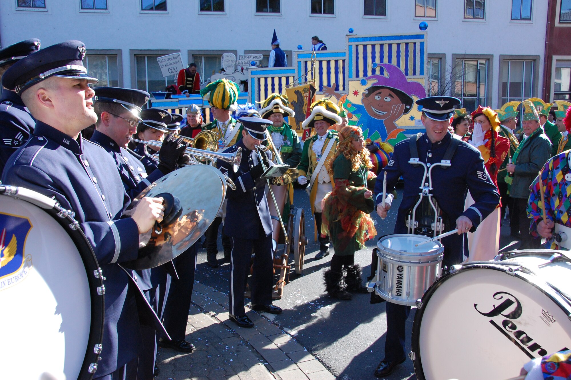KOBLENZ, Germany -- U.S. Air Forces in Europe Band members perform an impromptu Dixieland jam session with members of a local Musikverein after the Rosenmontag Parade in Koblenz, Germany, March 7, 2011. (U.S. Air Force photo by Staff Sgt. Rachel Trimble)
