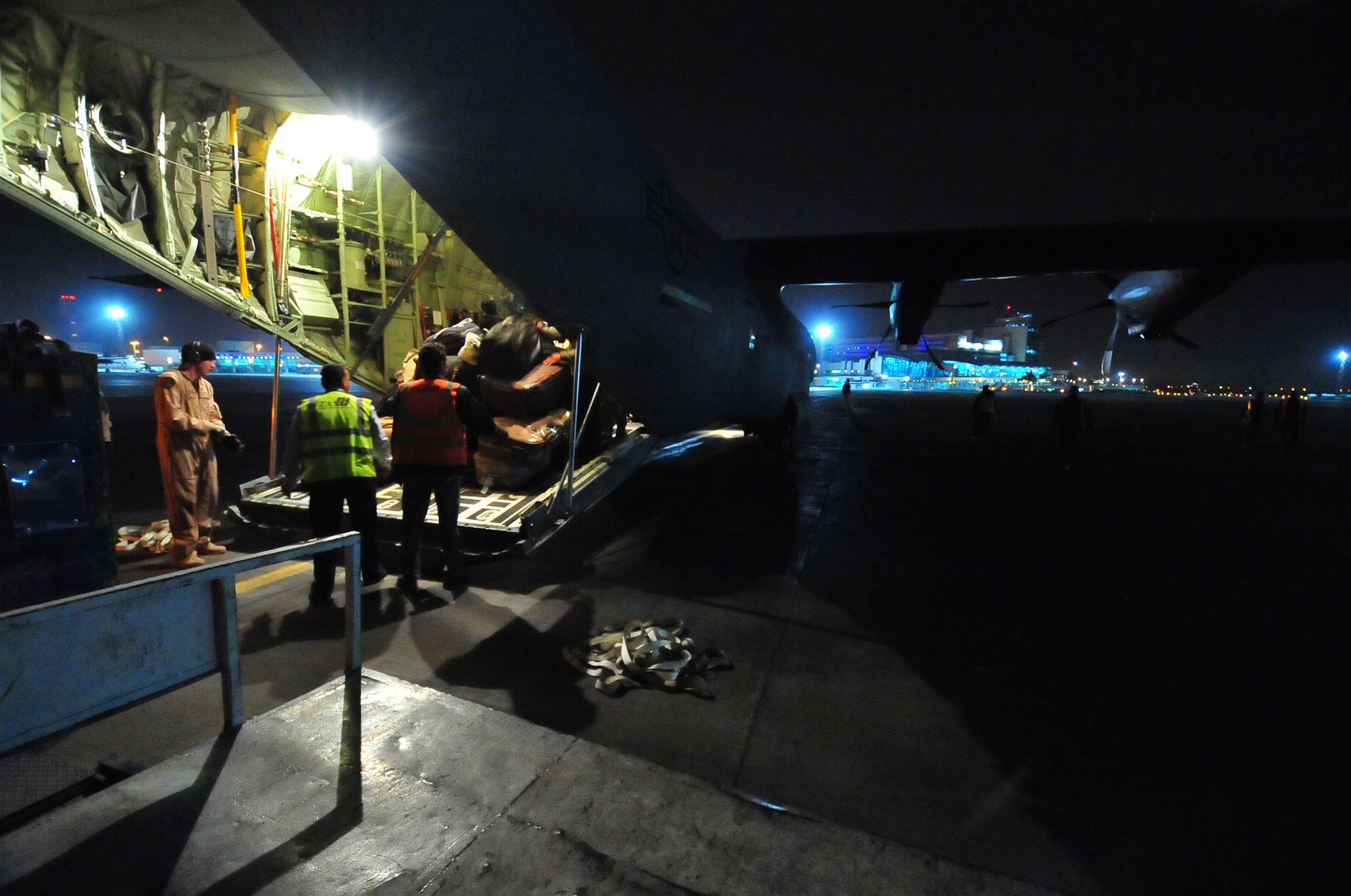 A C-130J from Ramstein Air Base, Germany carrying Egyptian refugees arrives March 5, 2011, at Cairo's International Airport. This was the first of many scheduled flights from Djerba, Tunisia to Cairo, Egypt. This response to the migration emergency is part of the U.S. forces commitment to providing humanitarian assistance to refugees and displaced victims of the crisis in Libya. (U.S. Army photo/Staff Sgt. Brendan Stephens)