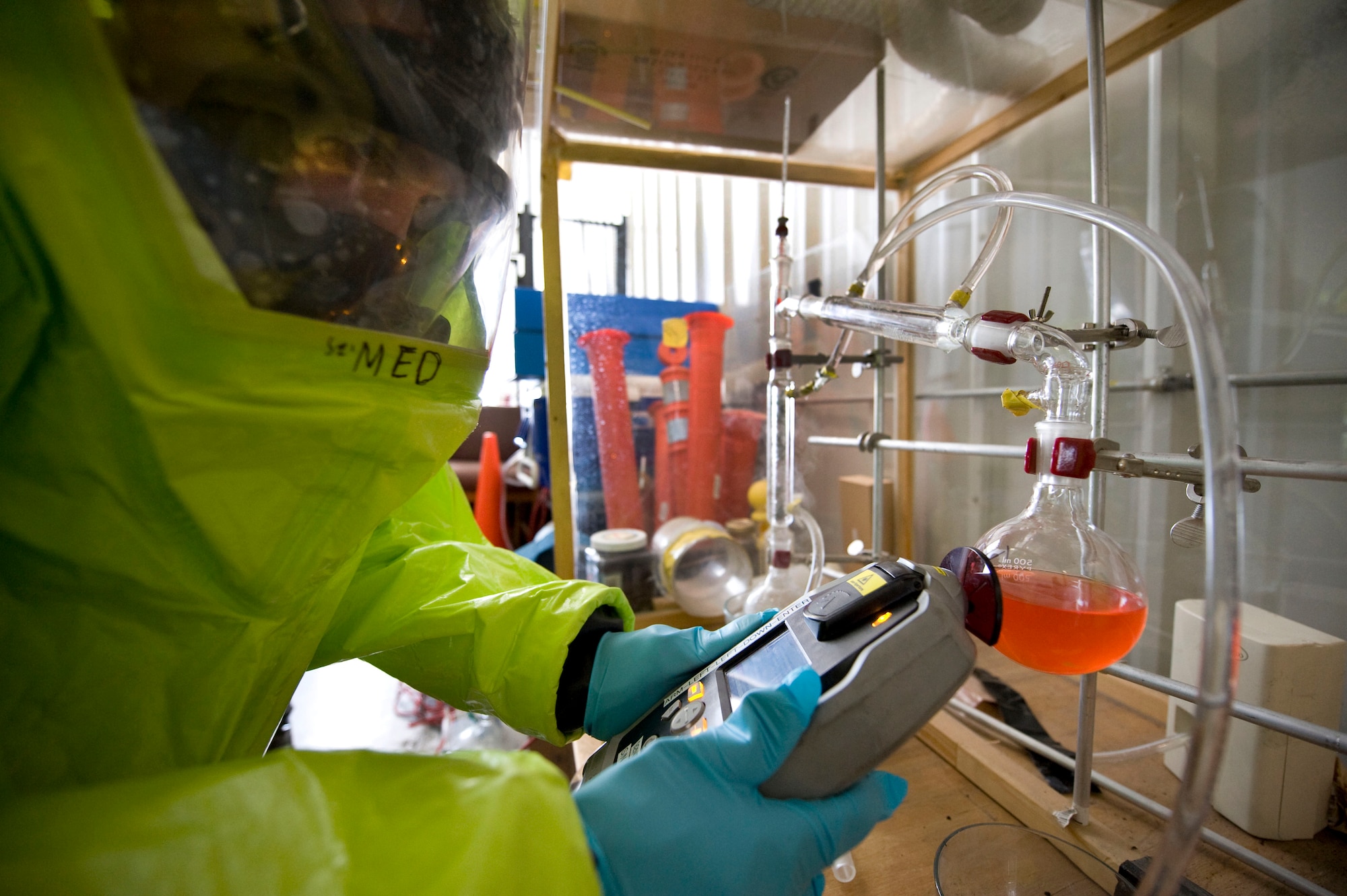 Airman 1st Class Drew Witter, 99 Civil Engineer Squadron  emergency management craftsman, tests samples of a chemical found during a Civil Support Team exercise Feb. 24.  A CST has the capability to responding to chemical, biological, radiological and nuclear agents during natural and manmade disasters.   (U.S. Air Force Photo by Staff Sgt. William P. Coleman)

