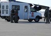 MINOT AIR FORCE BASE, N.D. -- Airmen of 5th Security Forces Squadron detain two members of 5th Aircraft Maintenance Squadron during a suspected security incident, here Mar. 1. The Airmen were on duty as part of an operational readiness inspection. (U.S. Air Force photo/ Senior Airman Michael J. Veloz)