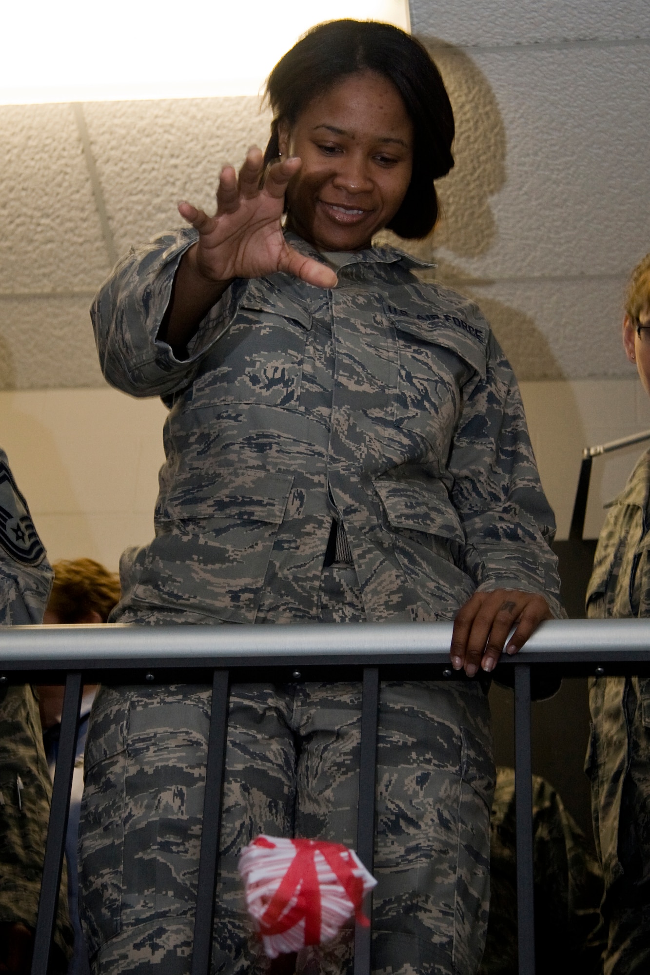 GRISSOM AIR RESERVE BASE, Ind. -- Staff Sgt. Marissa Bethea, 434th Force Support Squadron personnel technician, drops an egg from a stairwell during the team building portion of Wingman Day held here March 6. Sergeant Bethea and other 434th Air Refueling Wing Airmen took a few hours out of the March unit training assembly to partake in training that was focused on building Airman resiliency and improving unit cohesion. (U.S. Air Force photo/Tech. Sgt. Mark R. W. Orders-Woempner)

