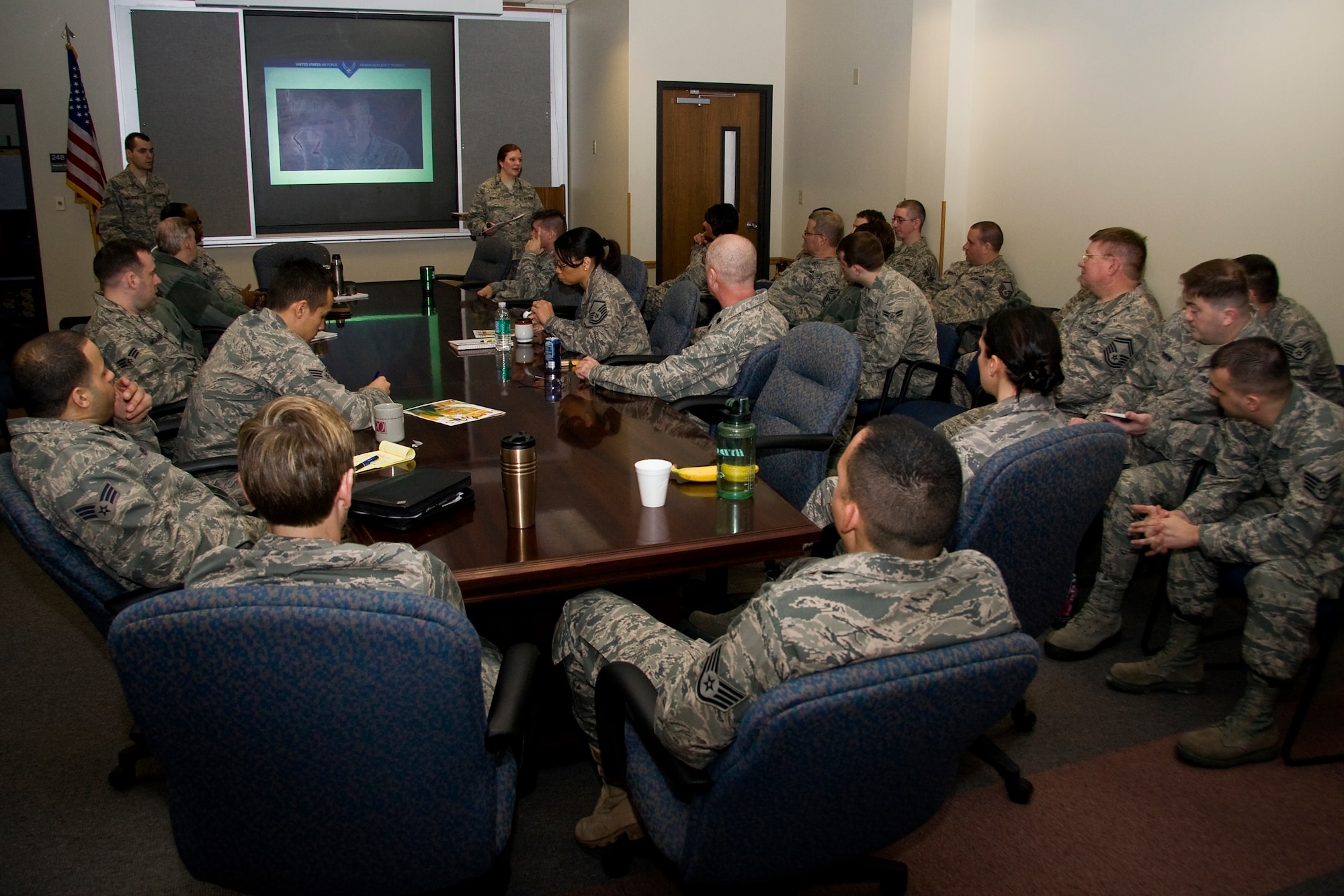 GRISSOM AIR RESERVE BASE, Ind. -- Capt. Kelly Howard and Staff Sgt. Martin Valadez lead a group of 434th Air Refueling Wing Airmen in discussions during Wingman Day here March 6. Airmen all across Grissom participated in a three-hour training session that focused on building Airmen resiliency and overall unit cohesion. Captain Howard is a public affairs officer and Sergeant Valadez is a paralegal technician with the 434th ARW. (U.S. Air Force photo/Tech. Sgt. Mark R. W. Orders-Woempner)
