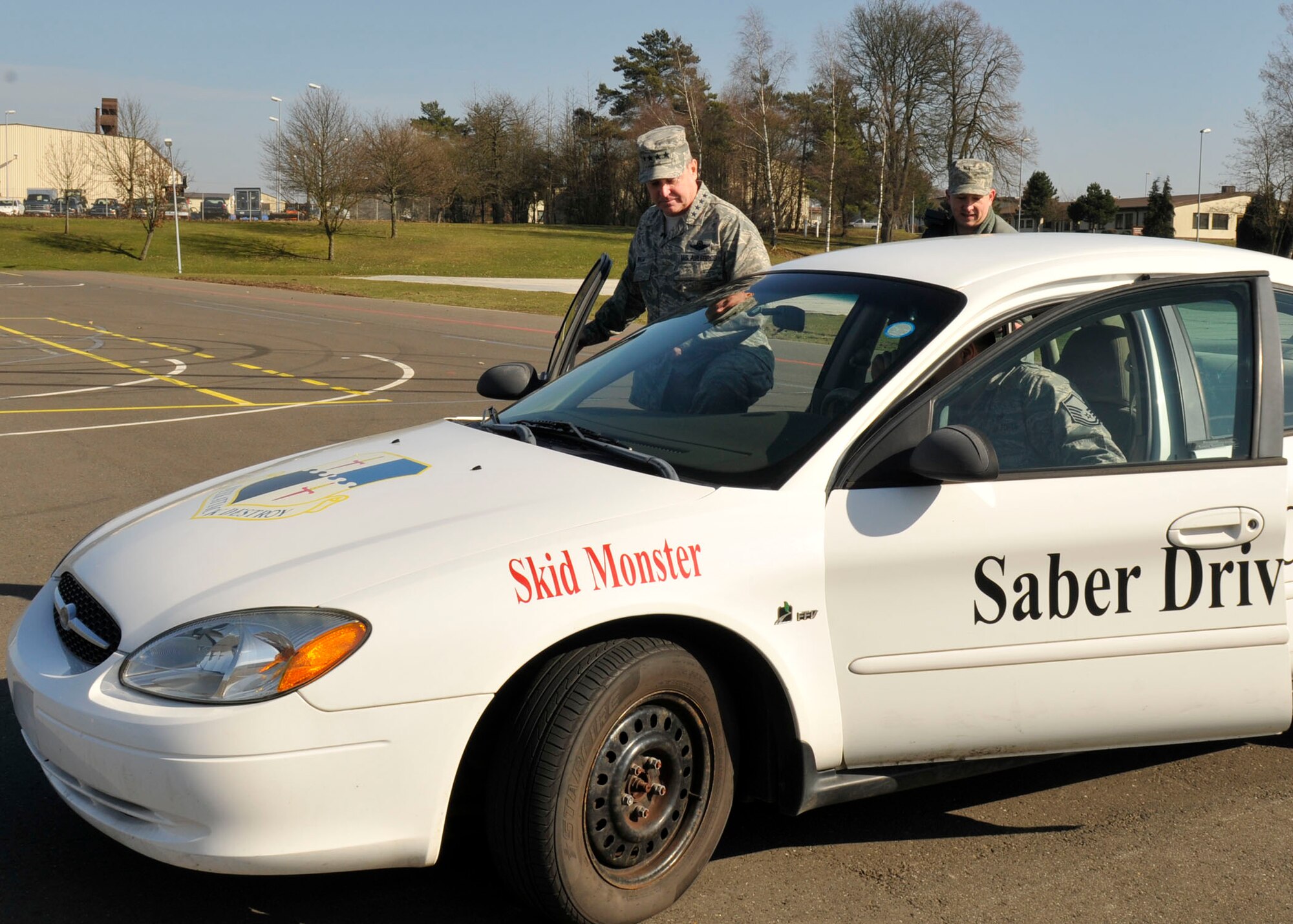 SPANGDAHLEM AIR BASE, Germany— Gen. Mark A. Welsh III, U.S. Air Forces in Europe commander, steps into the Saber Driving Course Skid Monster for a demonstration here March 2. The USAFE leaders visited various facilities at Spangdahlem to gain a better understanding of the 52nd Fighter Wing. (U.S. Air Force photo/Airman 1st Class Brittney Frees)