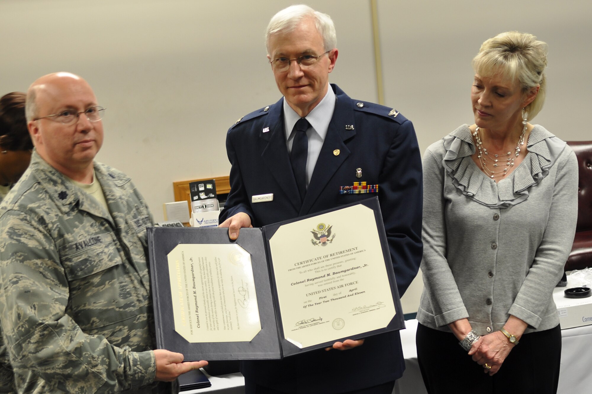 Lt. Col. Gary Avallone, optometrist, 307th Medical Squadron, poses with Colonel Raymond M. Baumgartner, Jr., a dentist with the 307th MDS, following his retirement ceremony at the 307th Bomb Wing Headquarters building at Barksdale Air Force Base, La., March 5, 2011. Colonel Baumgartner and his wife Kathryn, participated in the double retirement ceremony with Master Sgt. Michael Mazerat. (U.S. Air Force photo/Betty Stephens)