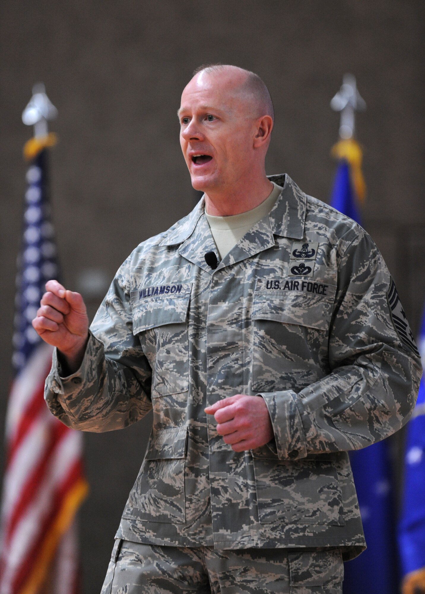 SPANGDAHLEM AIR BASE, Germany – Chief Master Sgt. David Williamson, U.S. Air Forces in Europe command chief, speaks to members of the 52nd Fighter Wing during a commander’s call here March 2. Chief Williamson and Gen. Mark A. Welsh III, USAFE commander, visited the wing to better understand how Airmen here operate. (U.S. Air Force photo/Senior Airman Nathanael Callon)