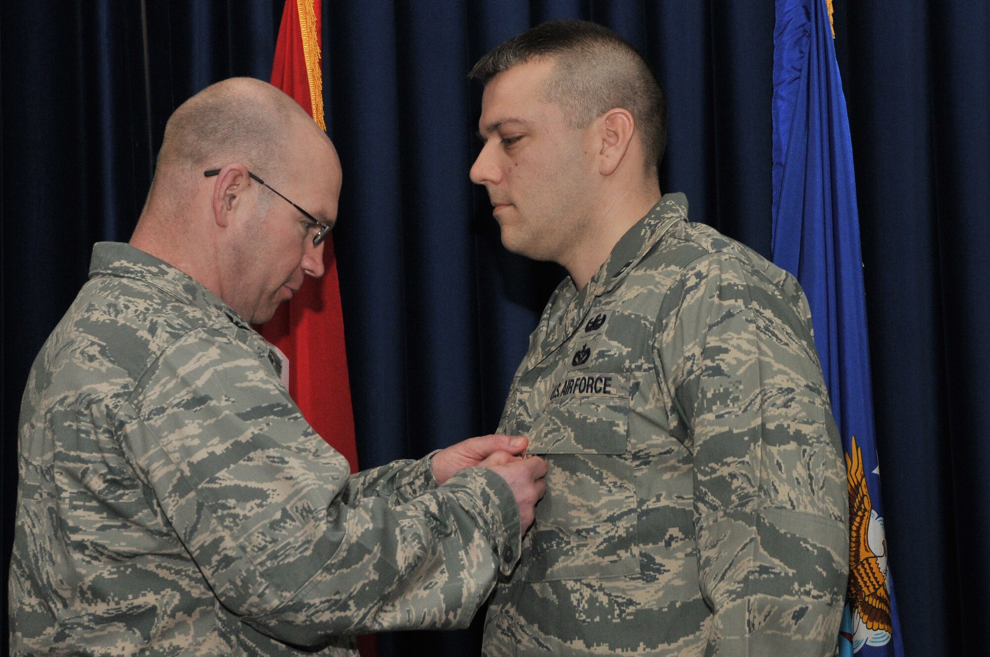 Col. Scott Enold, the 39th Mission Support Group commander, presents the Bronze Star medal to Capt. Matthew Lapham, from the 39th Civil Engineer Squadron, Feb. 17, 2011, at Incirlik Air Base, Turkey. Captain Lapham deployed as the 506th Explosive Ordinance Disposal flight commander and served with Joint Task Force Troy supporting 1st Brigade of the 1st Armored Division. During his time in Iraq he led 32 Airmen, six soldiers, four contractors and two interpreters to complete 597 successful missions. He also supported over 16,000 coalition forces and over one million local civilians across a 42,000 square-mile battle space in Iraq. Captain Lapham’s work with Iraqi Security Forces helped improve and increase Iraqi SF capabilities. (U.S. Air Force photo by Staff Sgt. Alex Montes/Released)