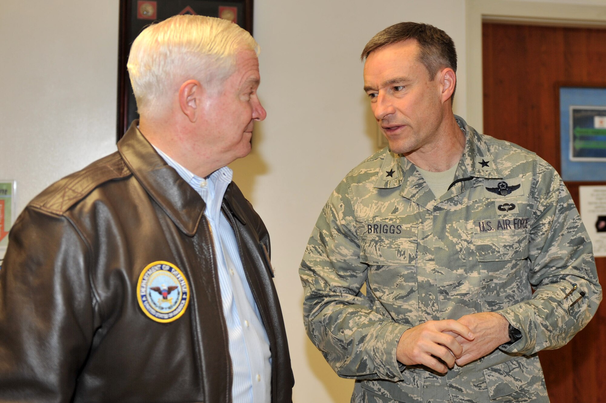 Defense Secretary Robert M. Gates (left) speaks with Brig. Gen. Jack L. Briggs II, 455th Air Expeditionary Wing commander, during his visit to Bagram Airfield, Afghanistan, March 7, 2011. (U.S. Air Force photo by Senior Airman Sheila deVera)